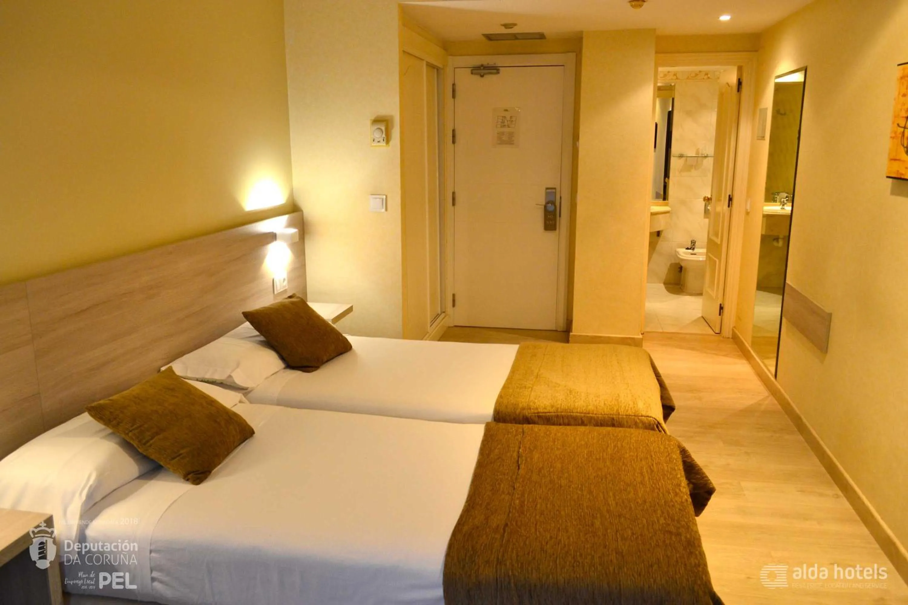 Bed in Hotel Alda San Carlos