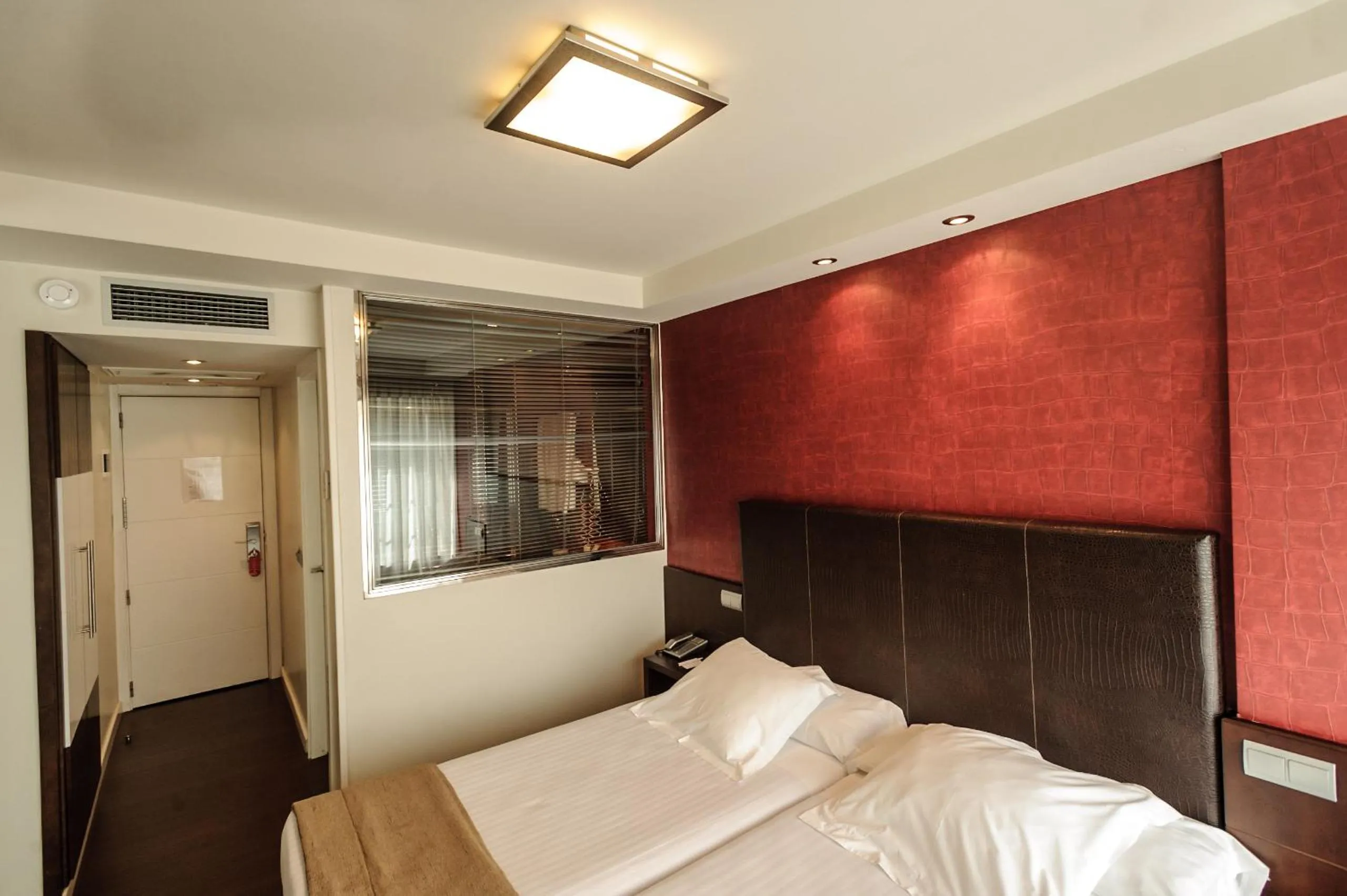 Bed in Hotel Alda San Carlos