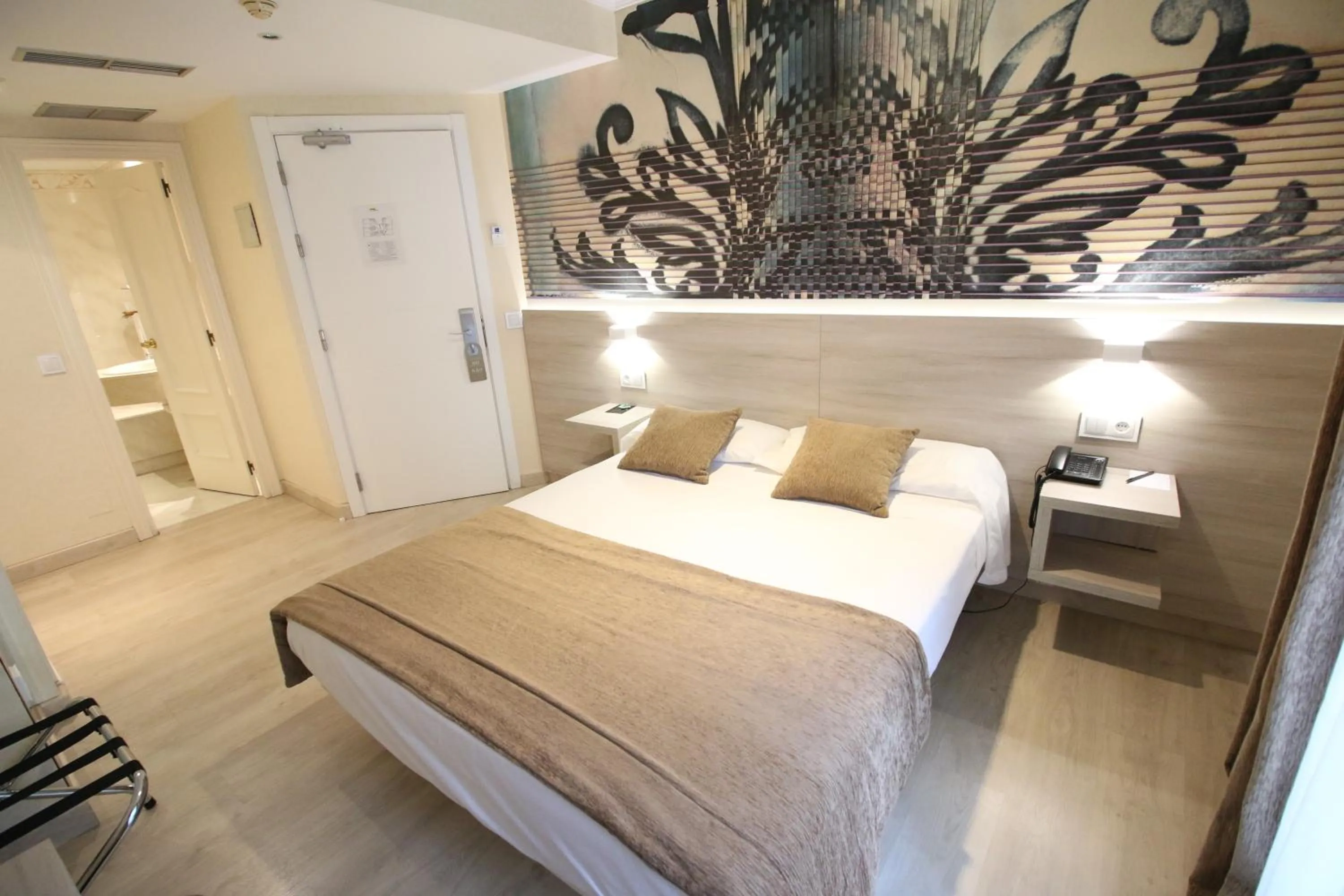 Bed in Hotel Alda San Carlos