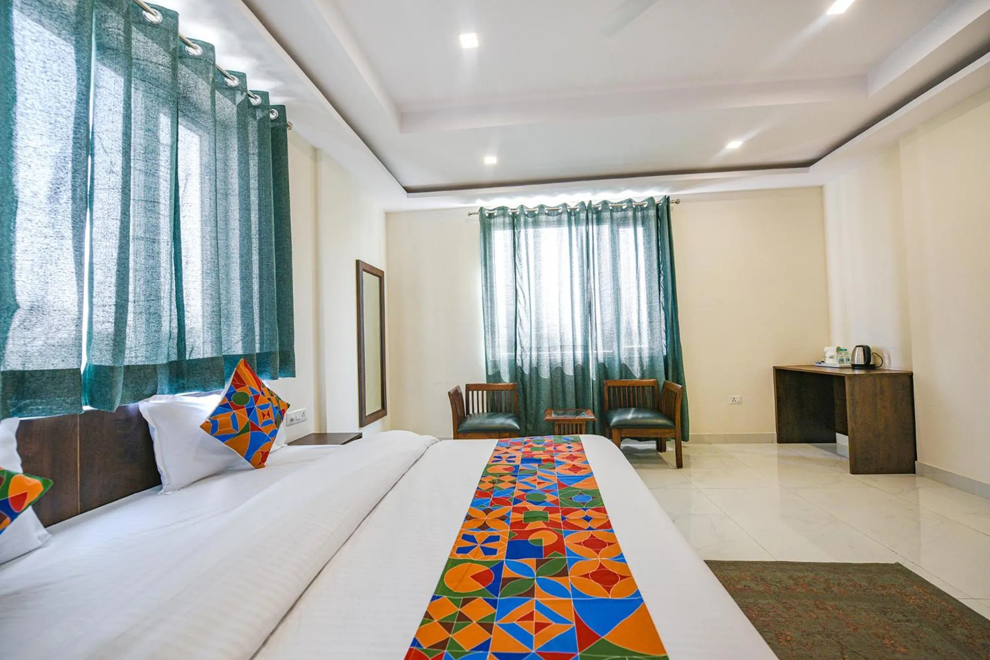 Bed in FabHotel Jaswinder Bhawan