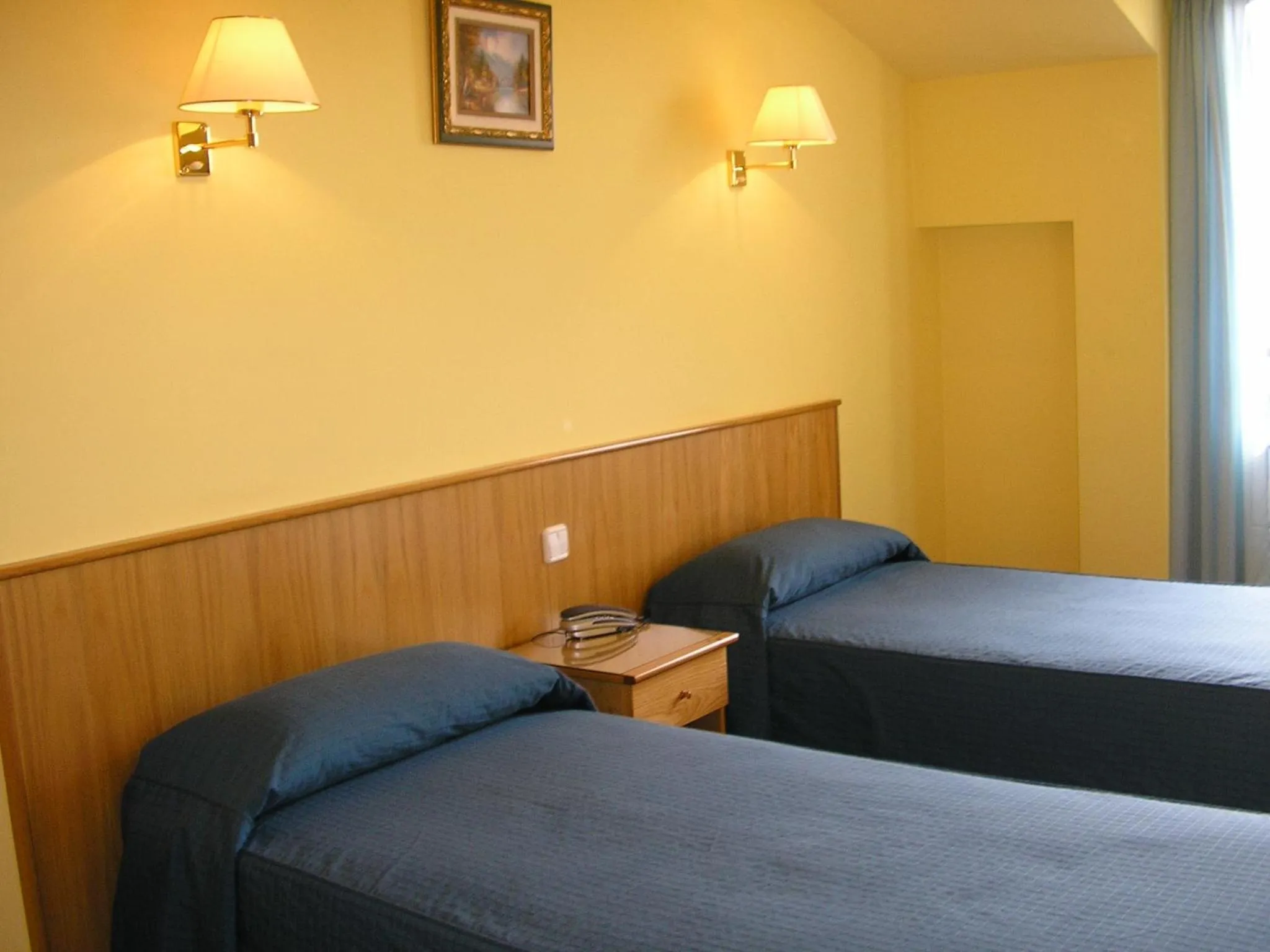 Bed in Hotel San Juan