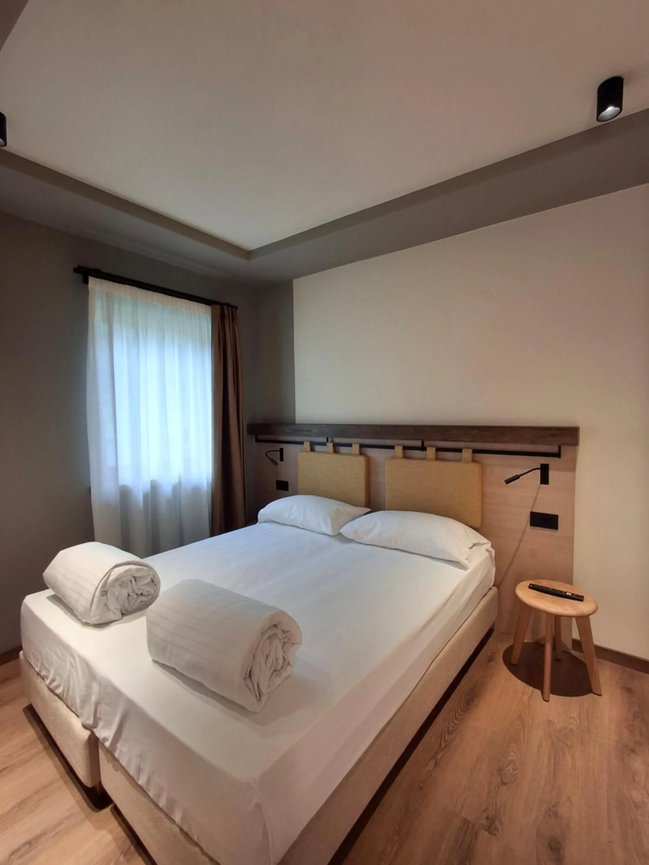 Bed in Hotel Dolomiti Saone