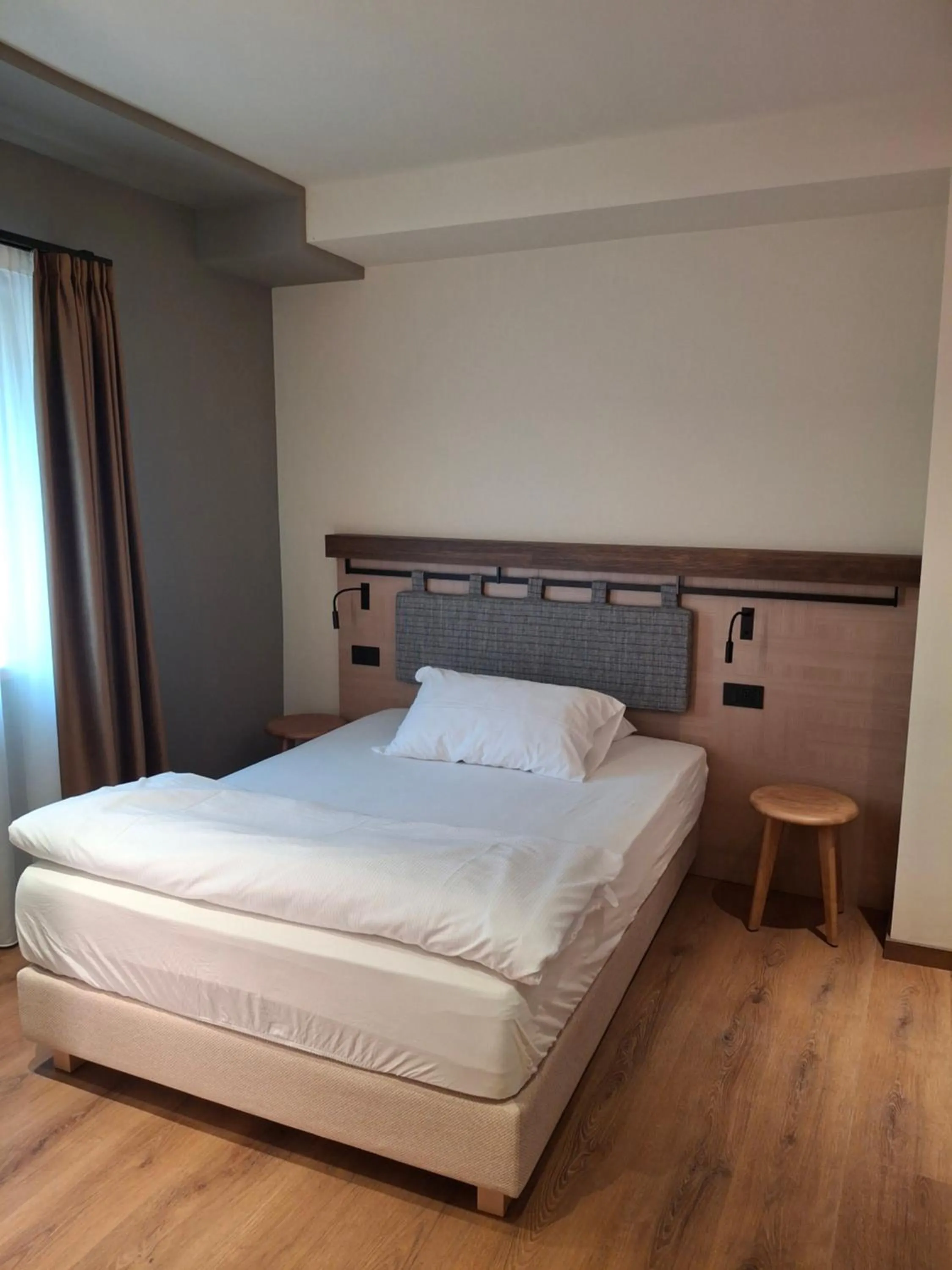 Bed in Hotel Dolomiti Saone