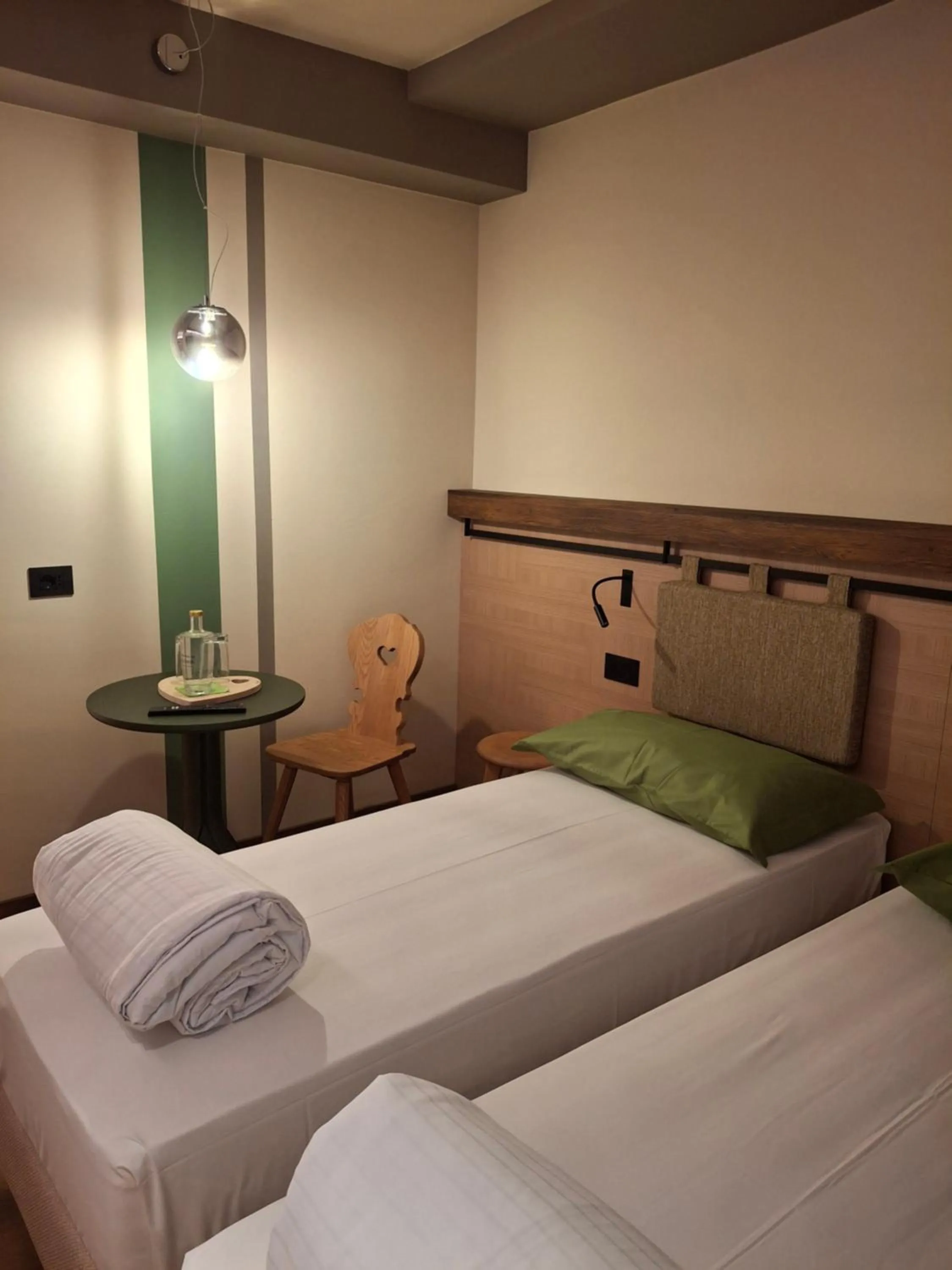 Bed in Hotel Dolomiti Saone
