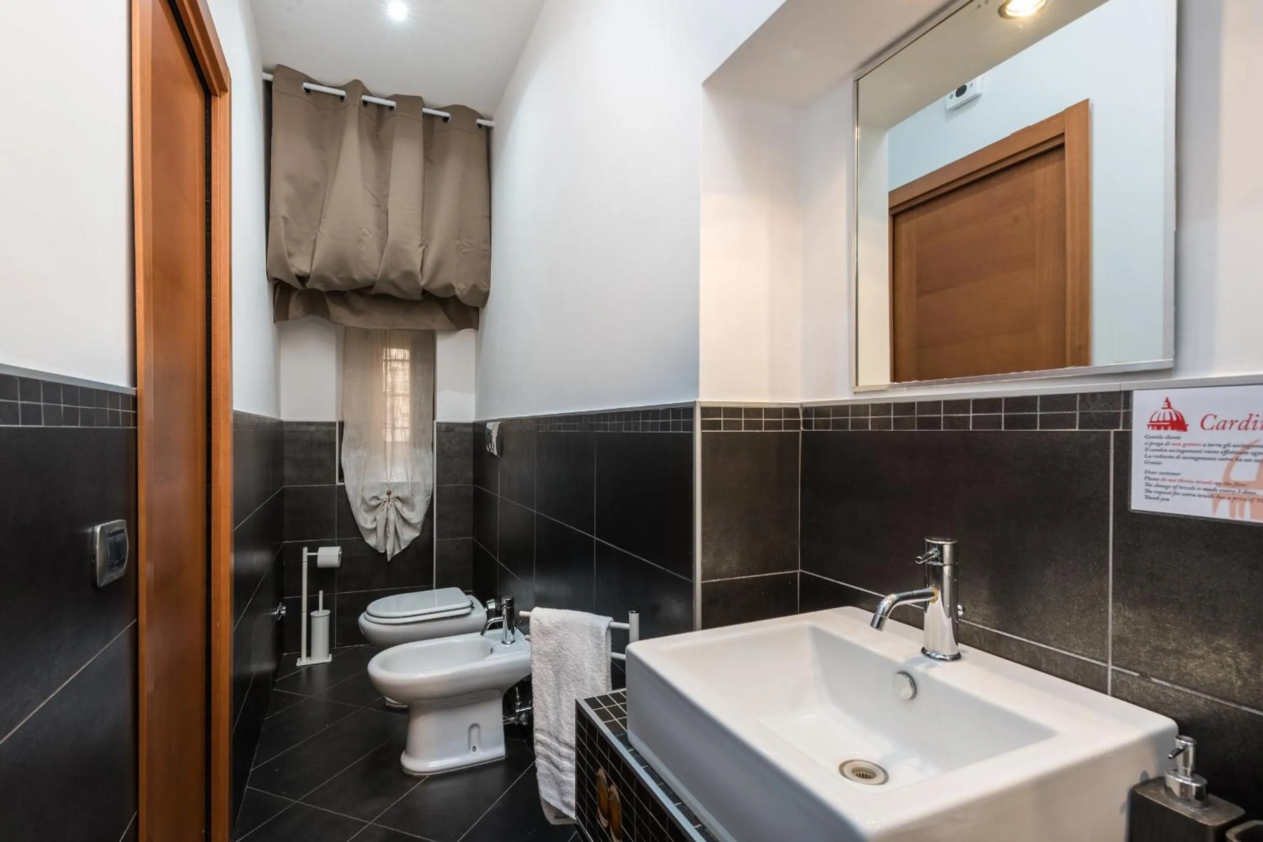 Toilet in Cardinal Vatican Inn