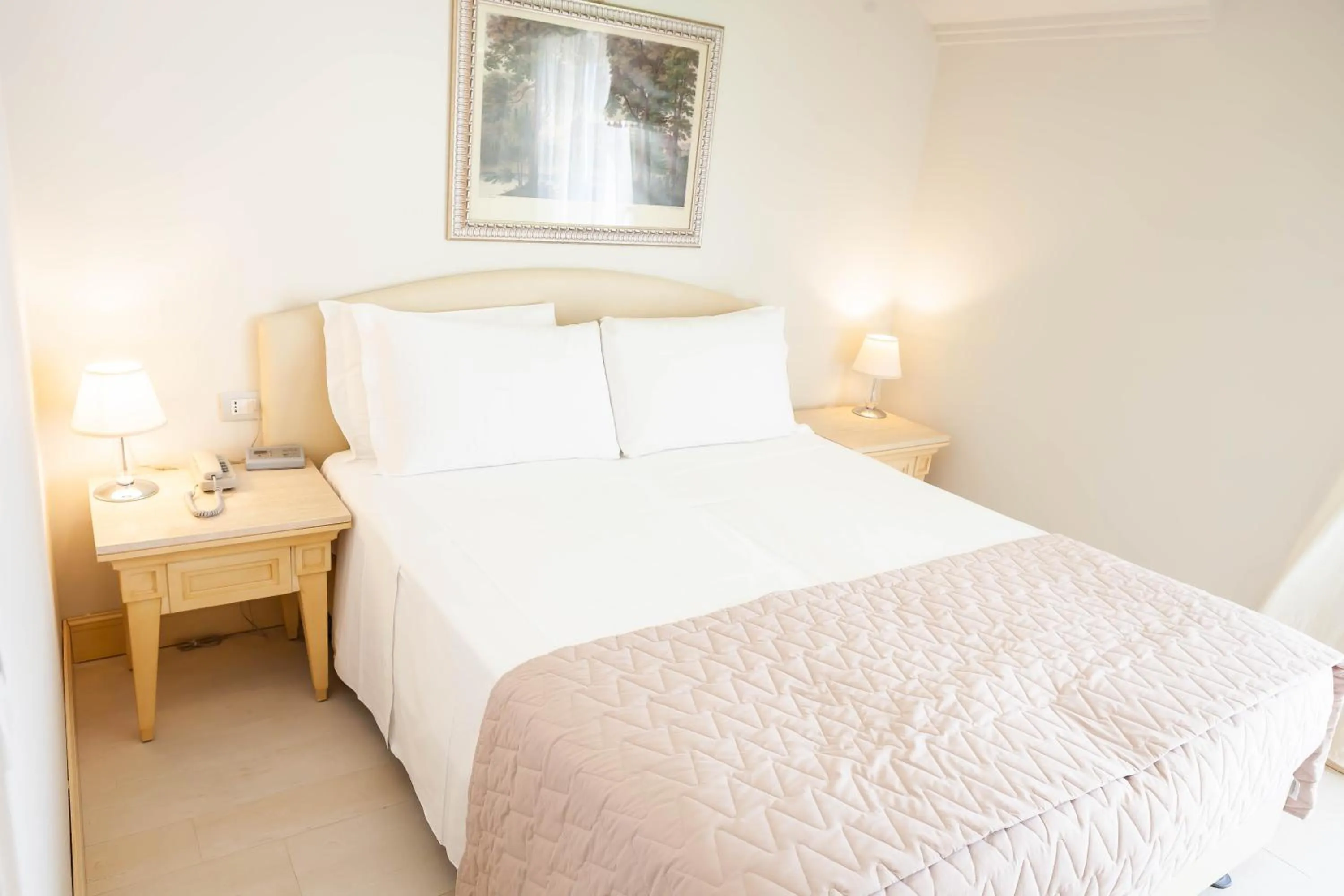 Bed in Hotel Conchiglia