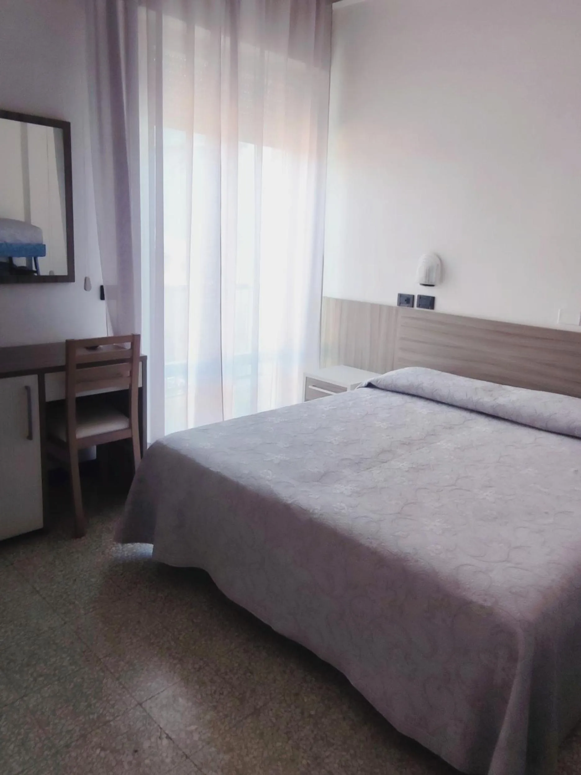 Bed in Hotel Ardesia