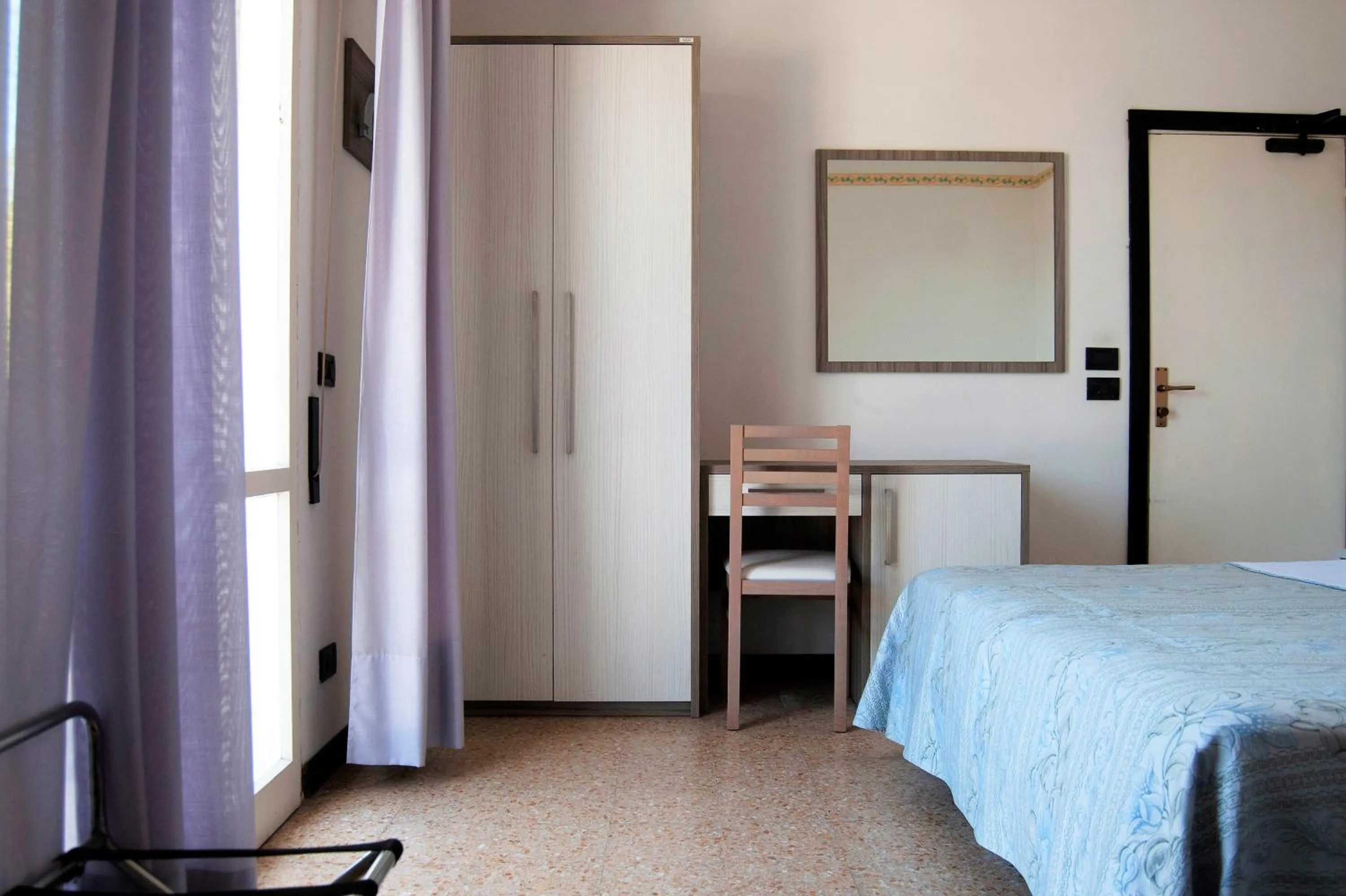 Bed in Hotel Ardesia