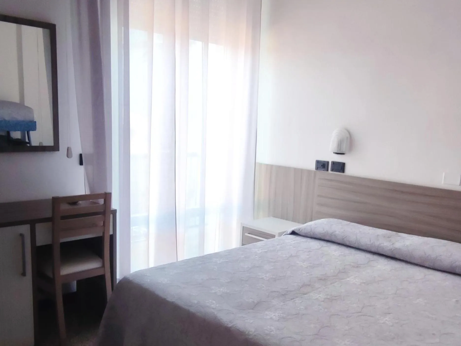 Bed in Hotel Ardesia