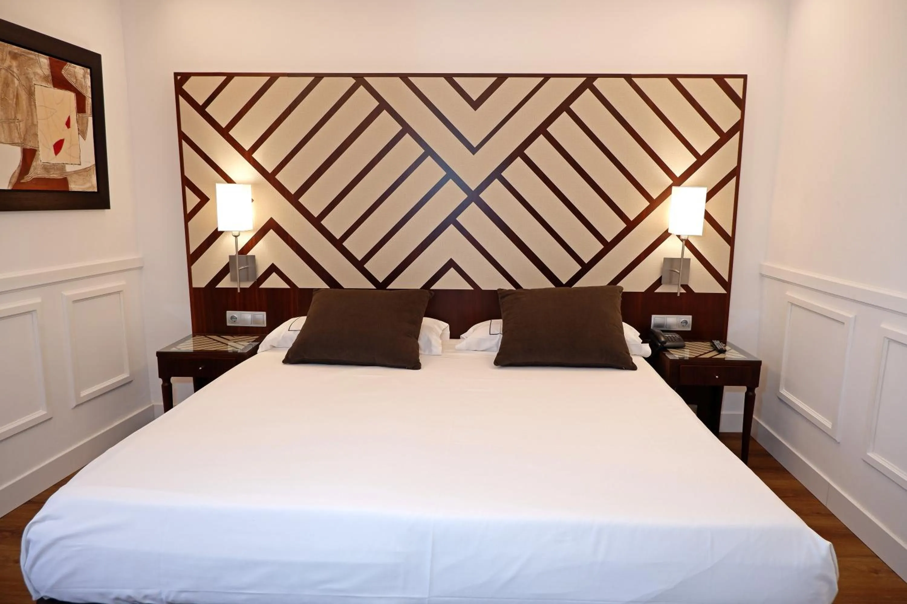 Decorative detail, Bed in Hotel Boutique Atrio