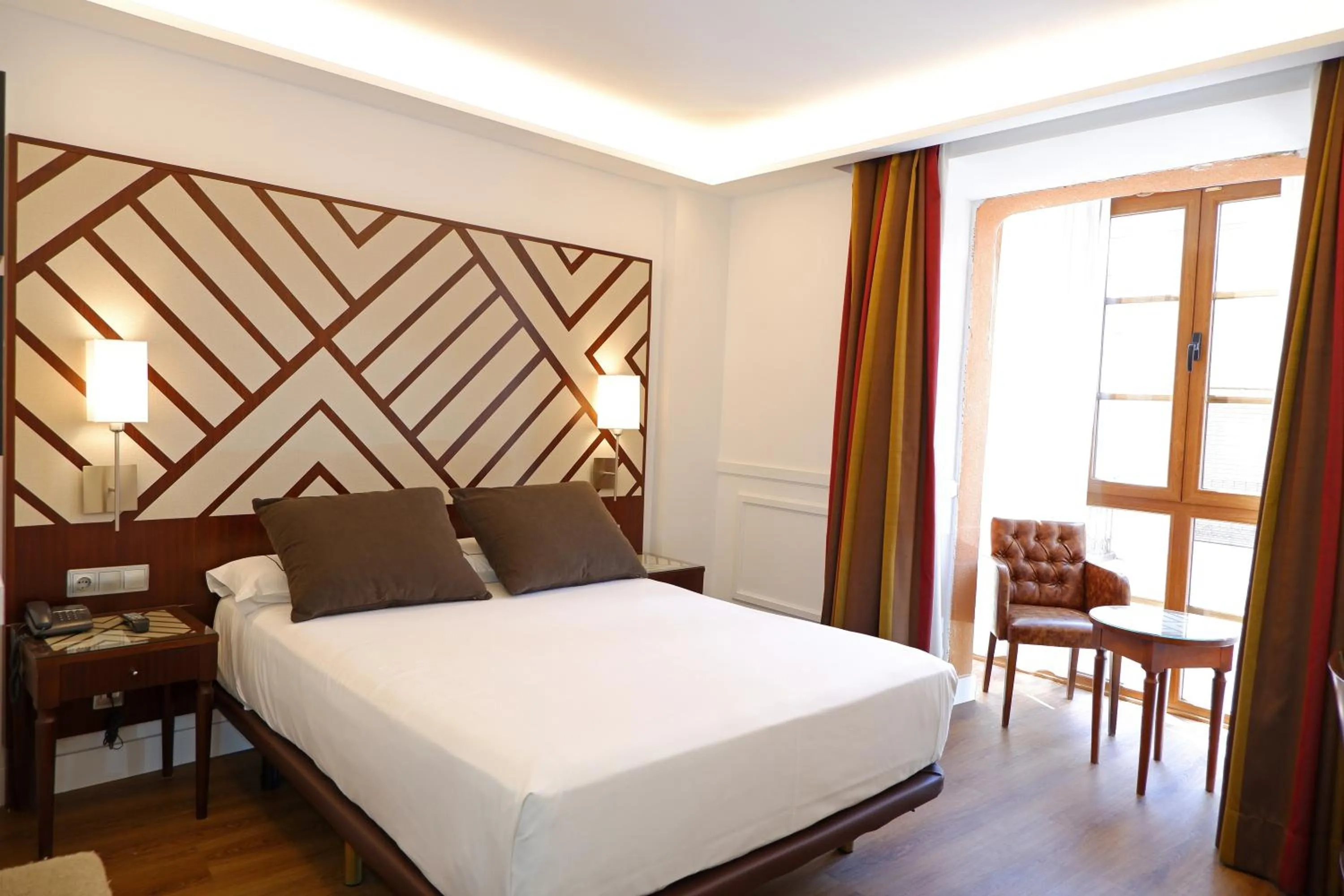 Bed in Hotel Boutique Atrio