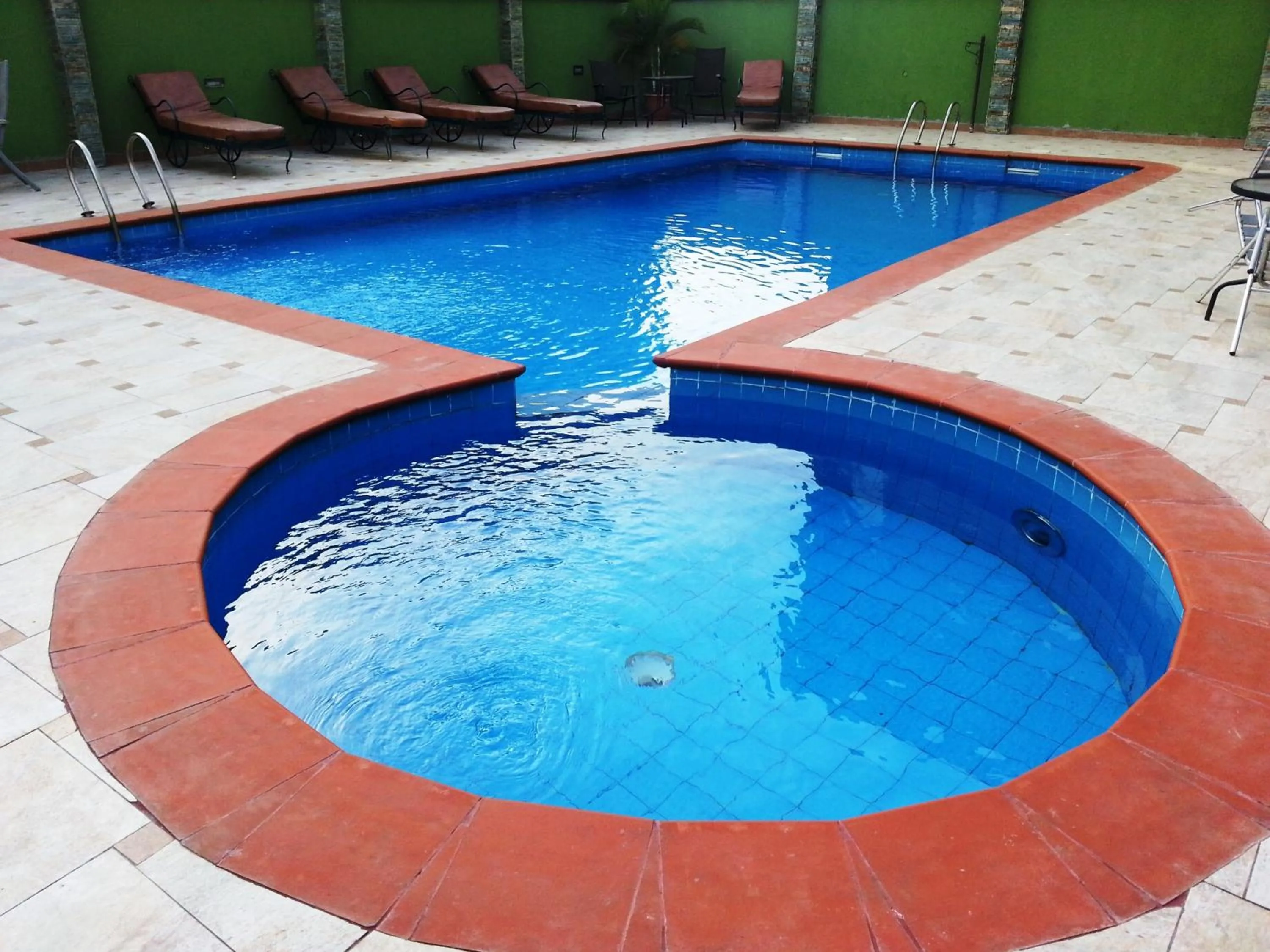 Swimming pool in De Rembrandt Hotels and Suites