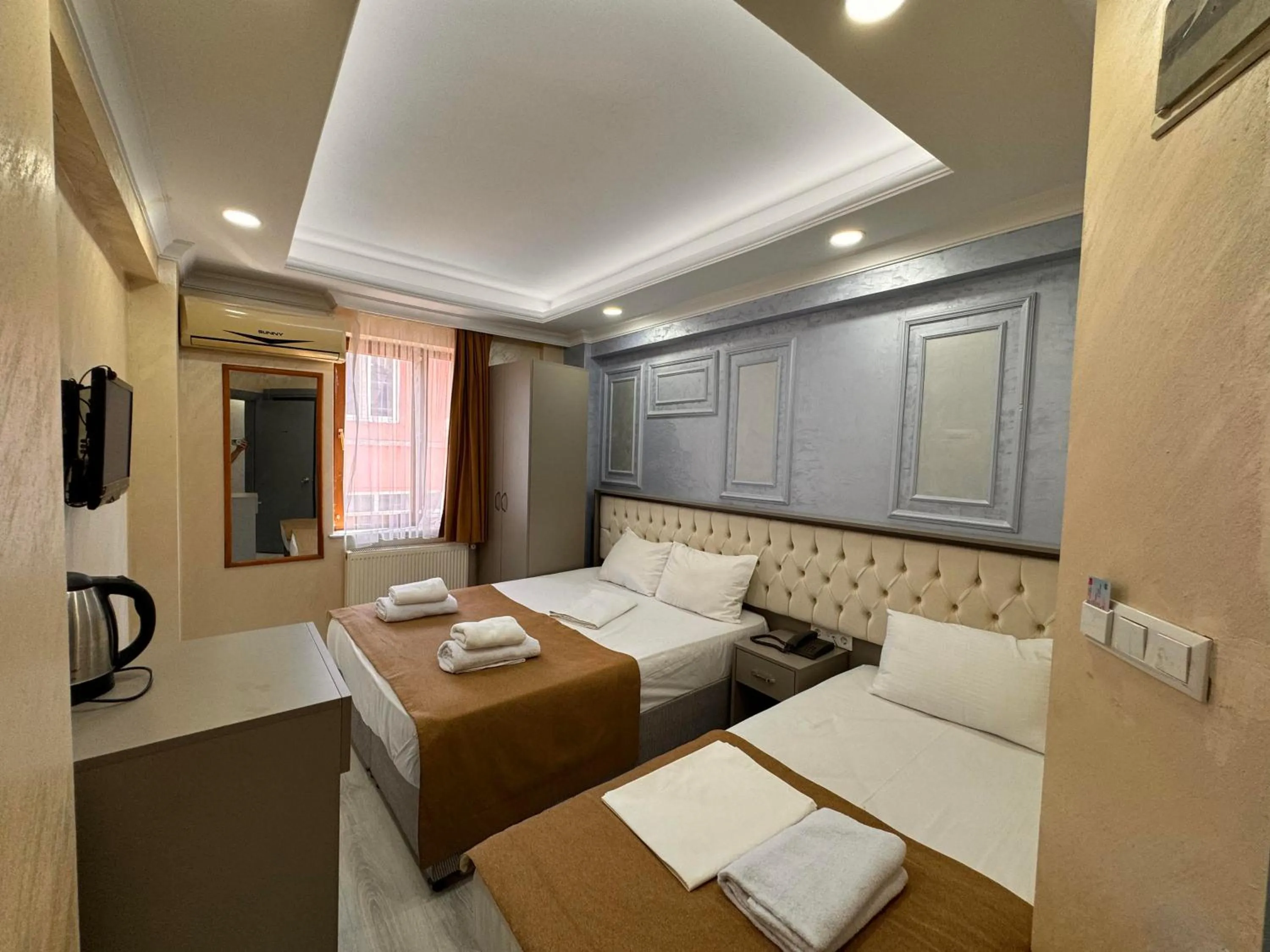 Bed in Grand Kybele Hotel