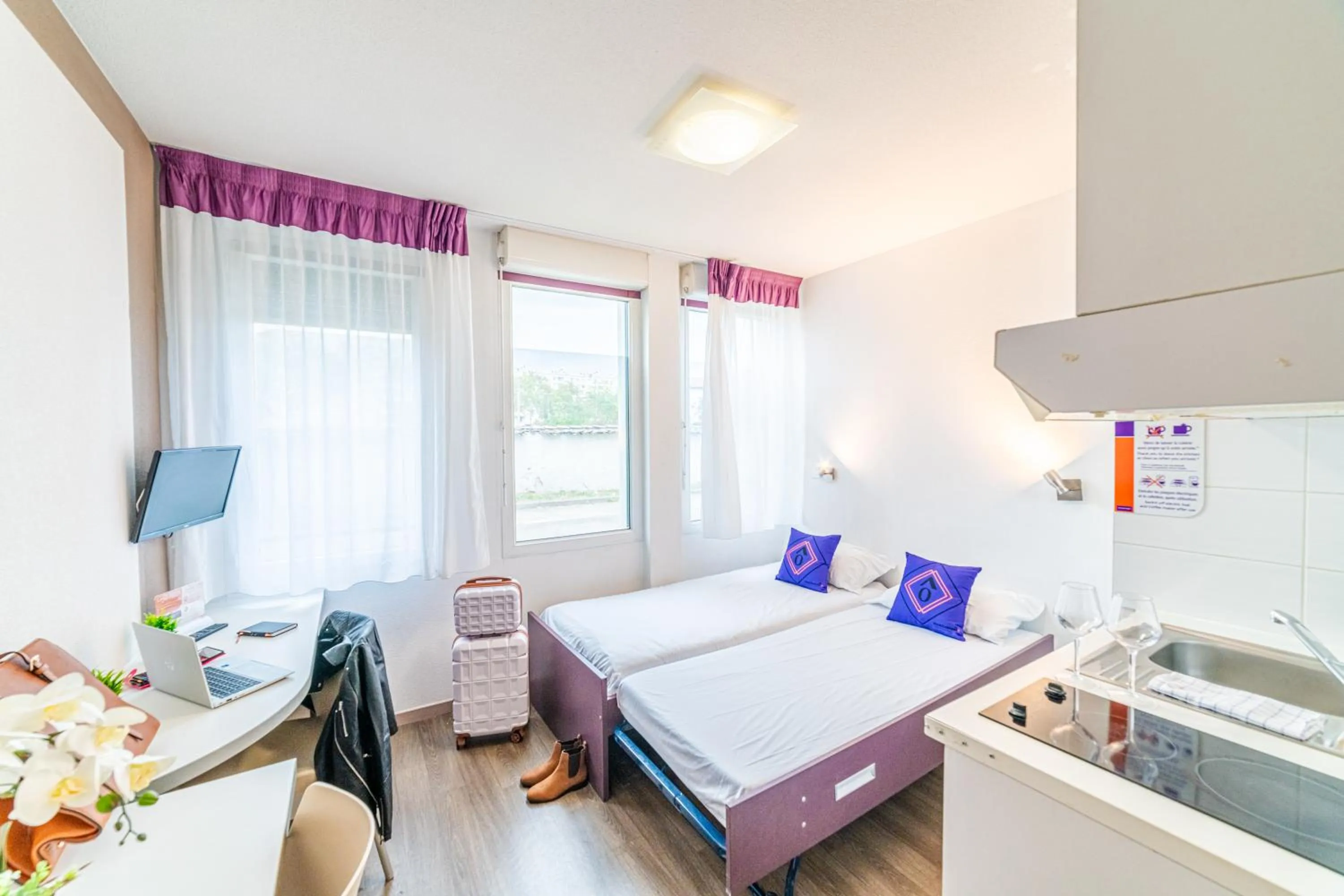 Bed in Montempô Appart'hôtel Lyon Viviani