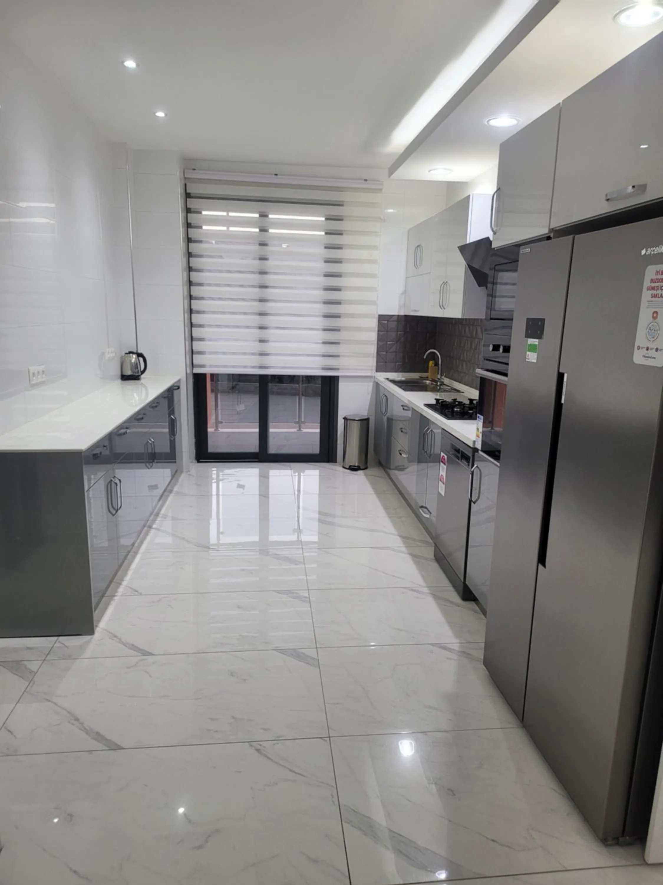 Kitchen or kitchenette in MARINA APPART Hôtel