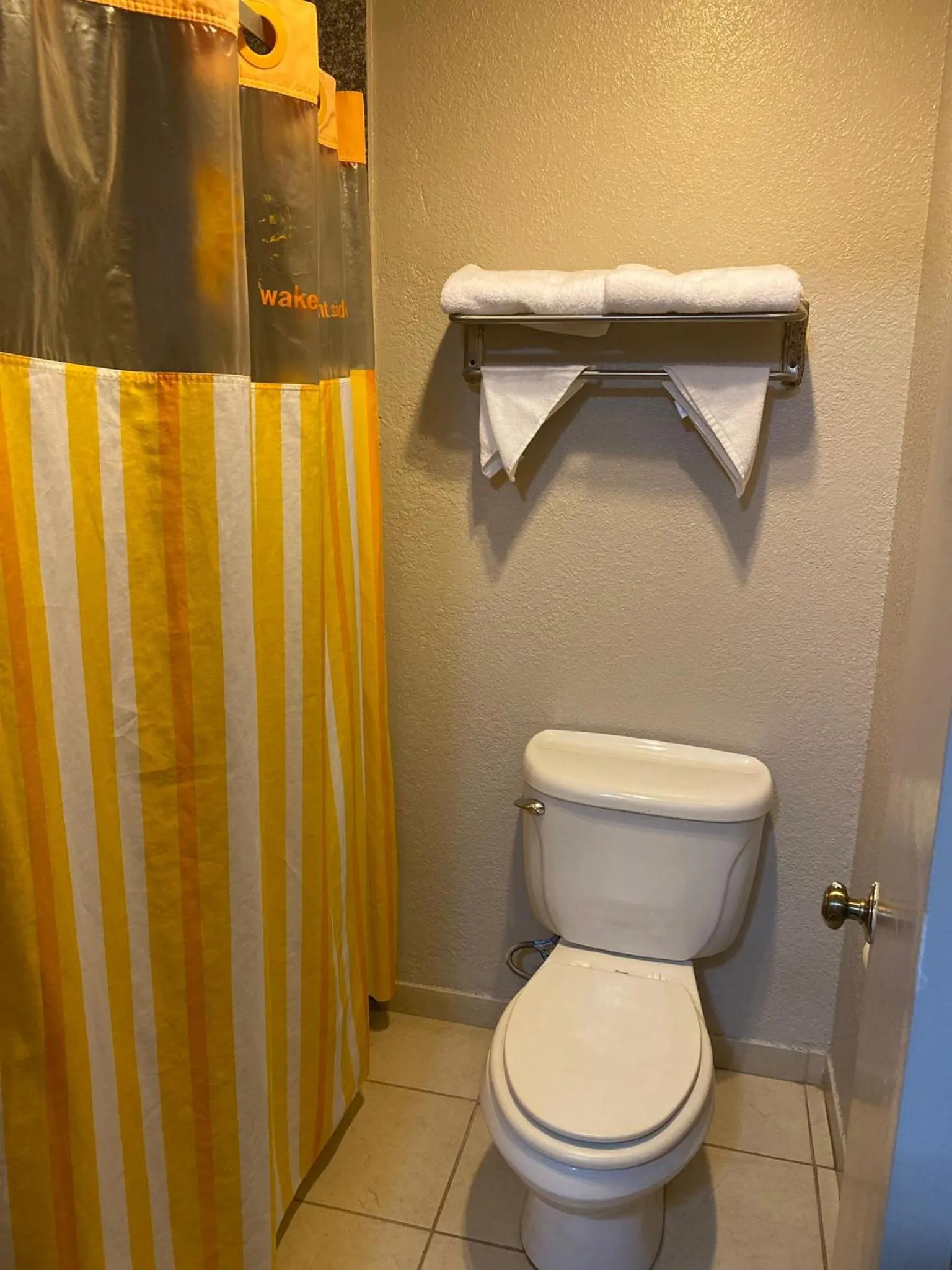 Toilet in Sunrise Inn