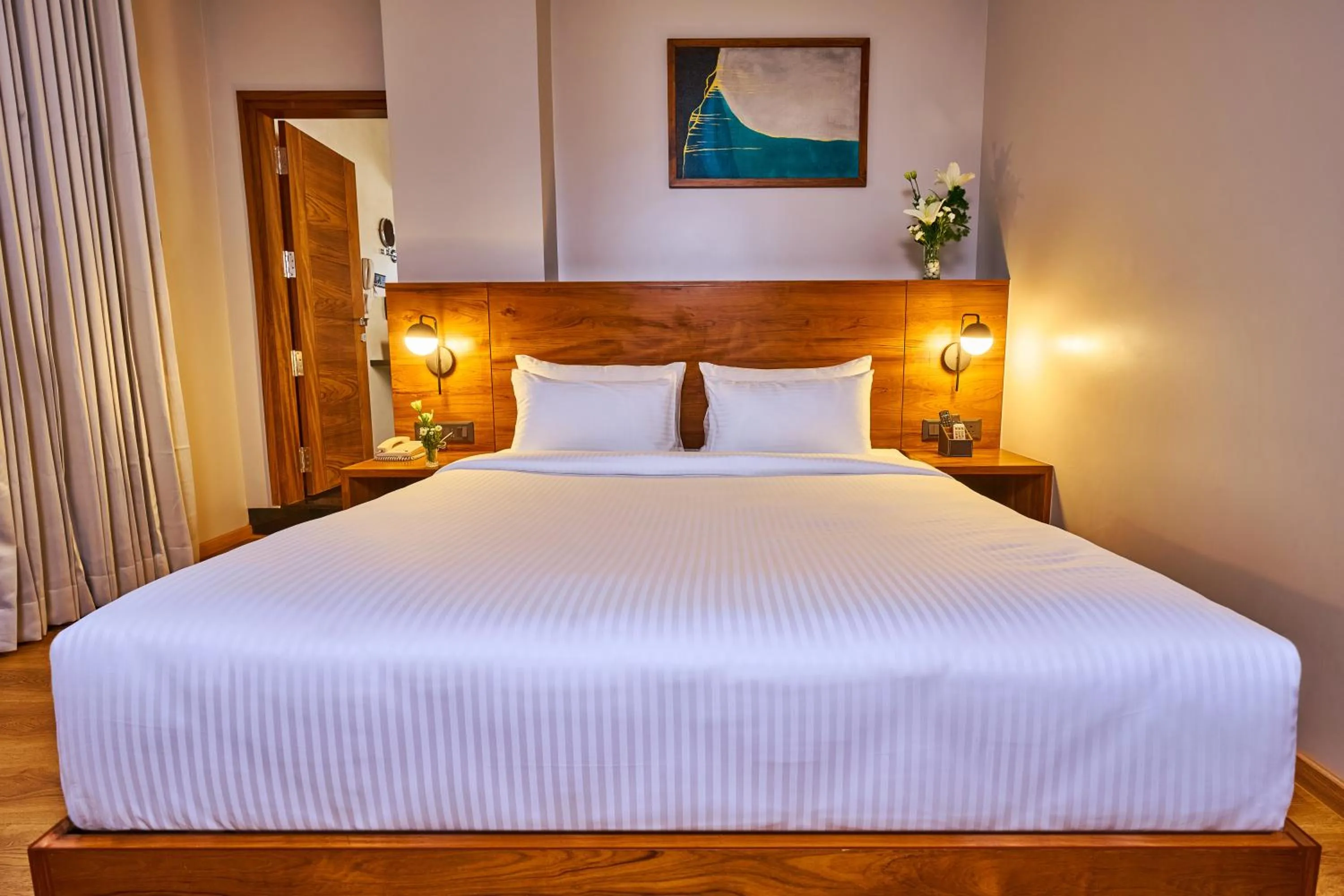 Photo of the whole room, Bed in Visthara Hotel