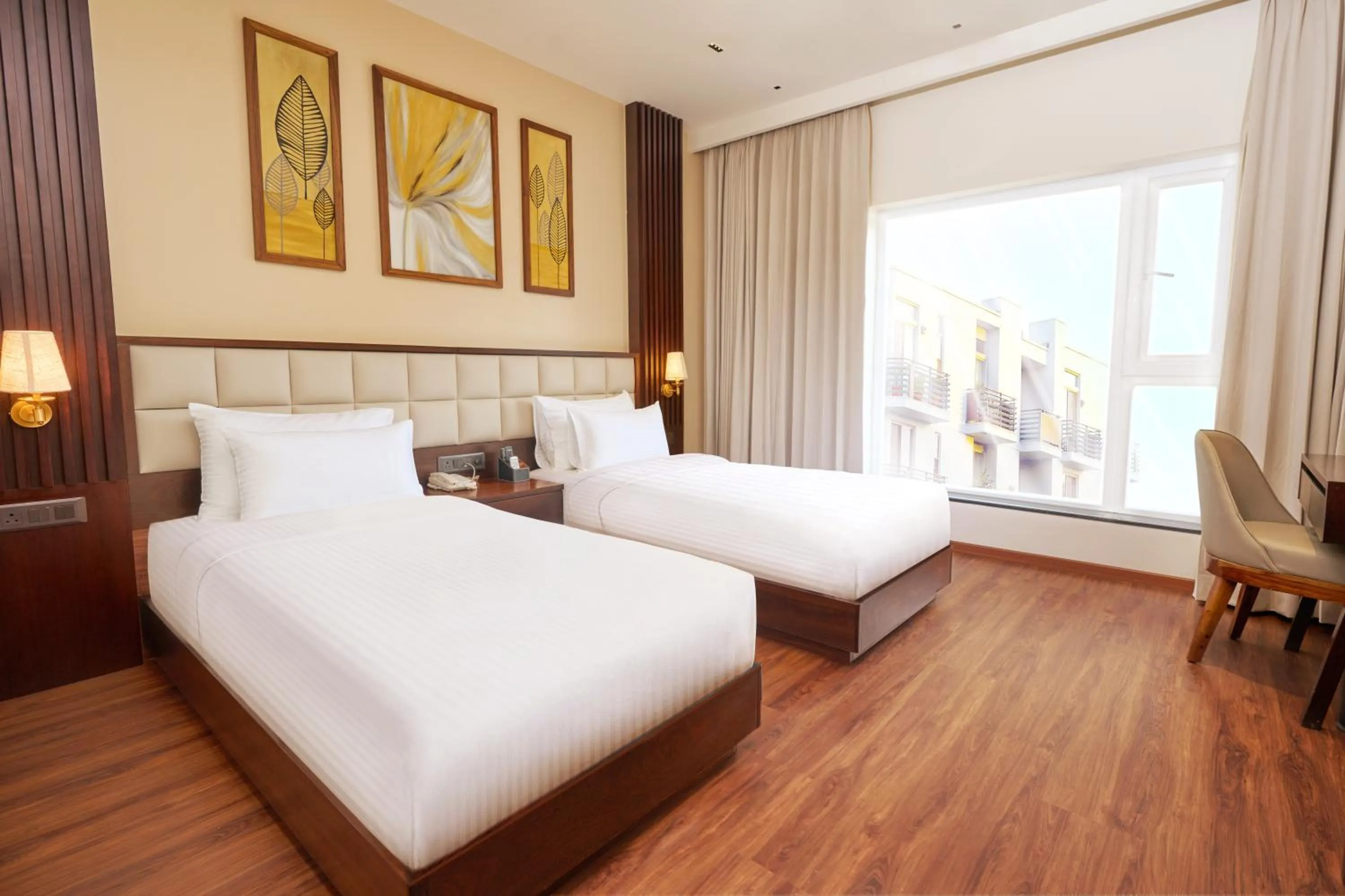 Photo of the whole room, Bed in Visthara Hotel