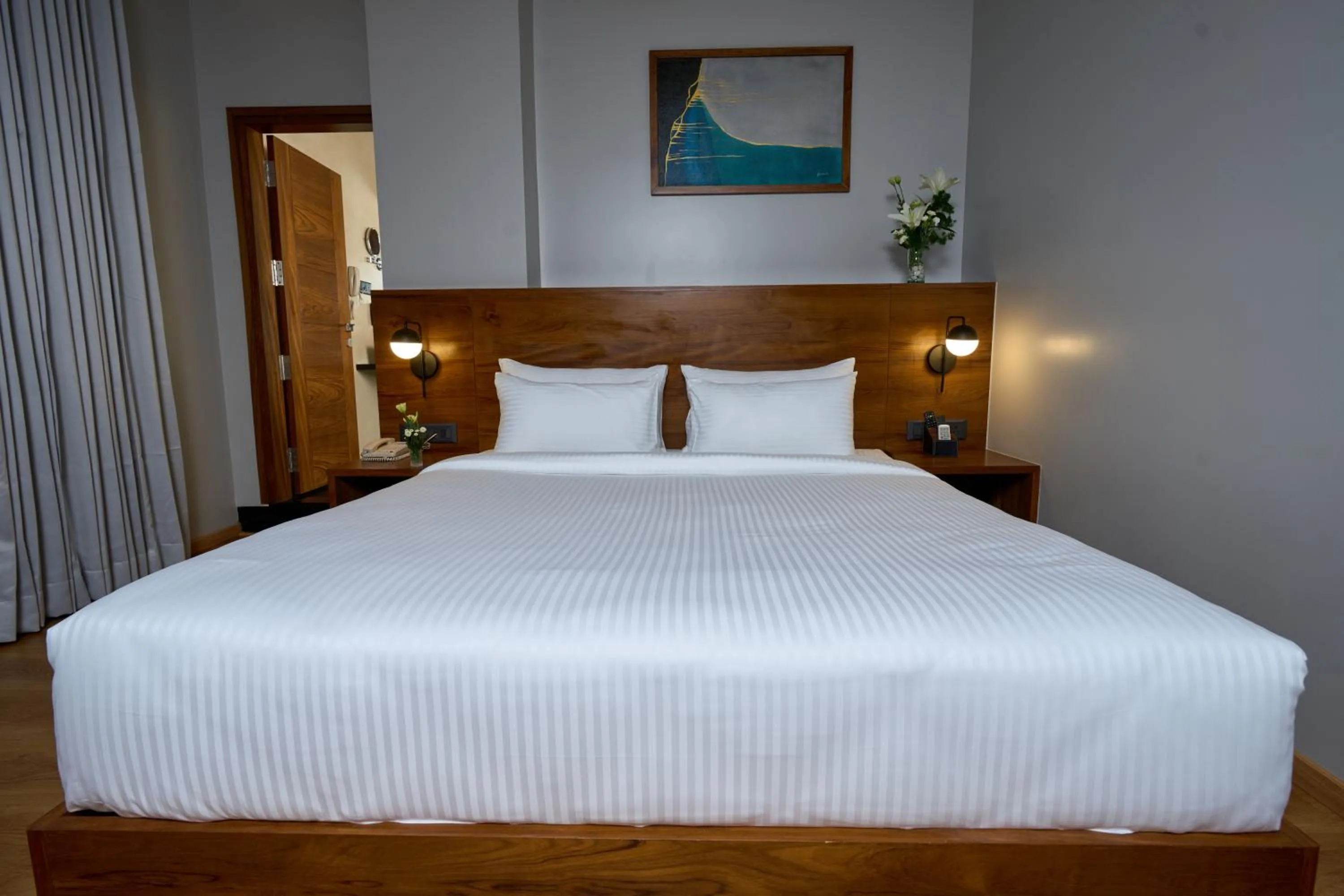 Bedroom, Bed in Visthara Hotel