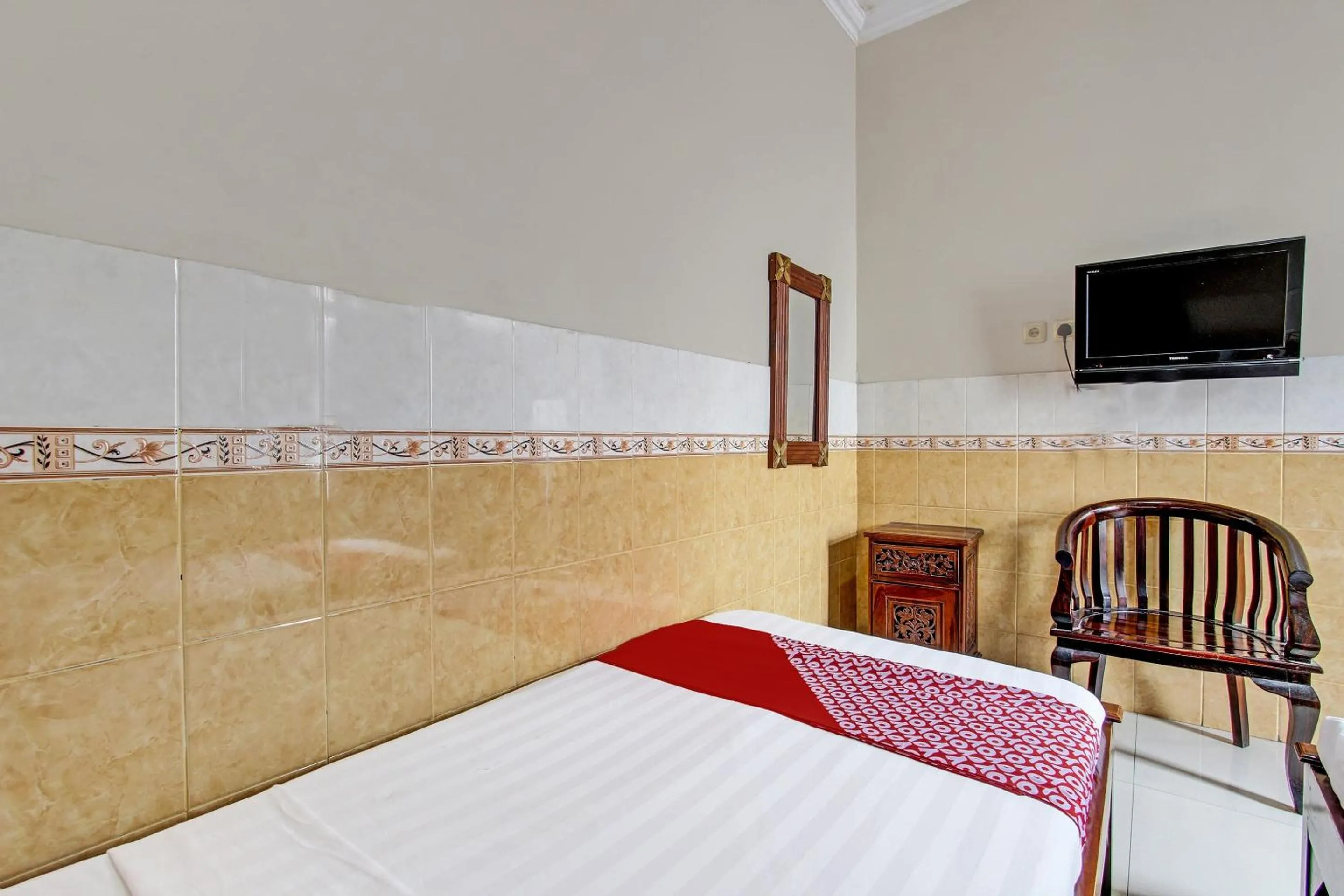 Bedroom in OYO 91785 Hotel Srikandi Kalasan