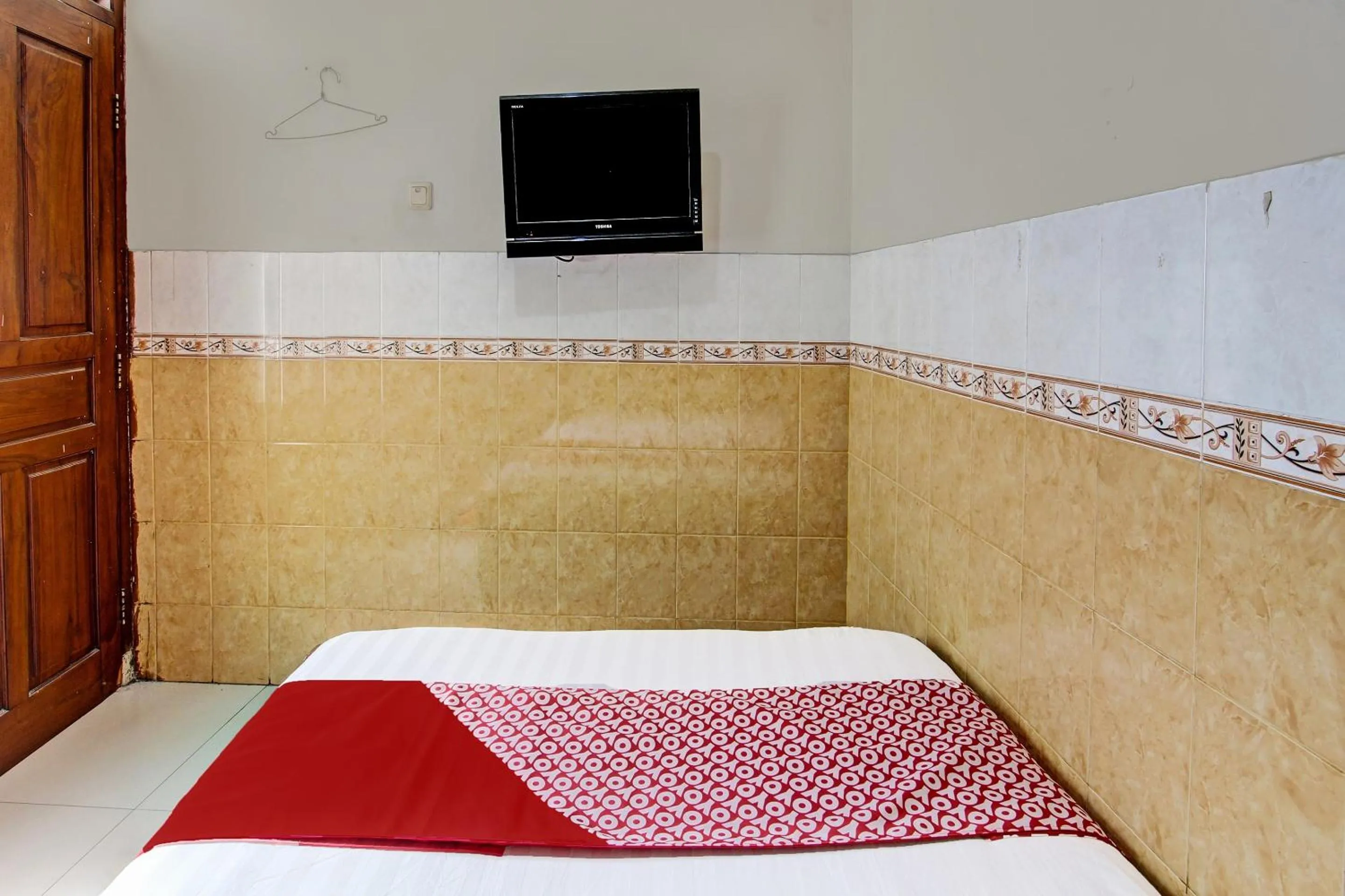 Bedroom in OYO 91785 Hotel Srikandi Kalasan