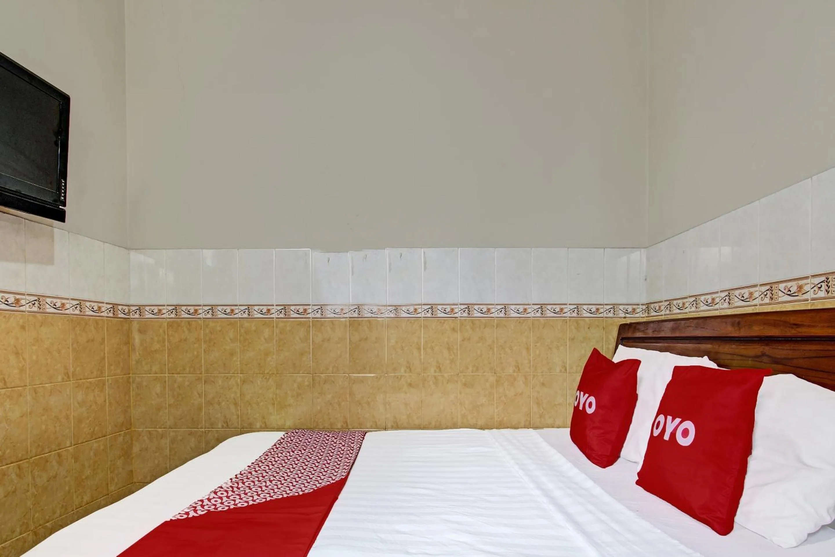 Bedroom in OYO 91785 Hotel Srikandi Kalasan