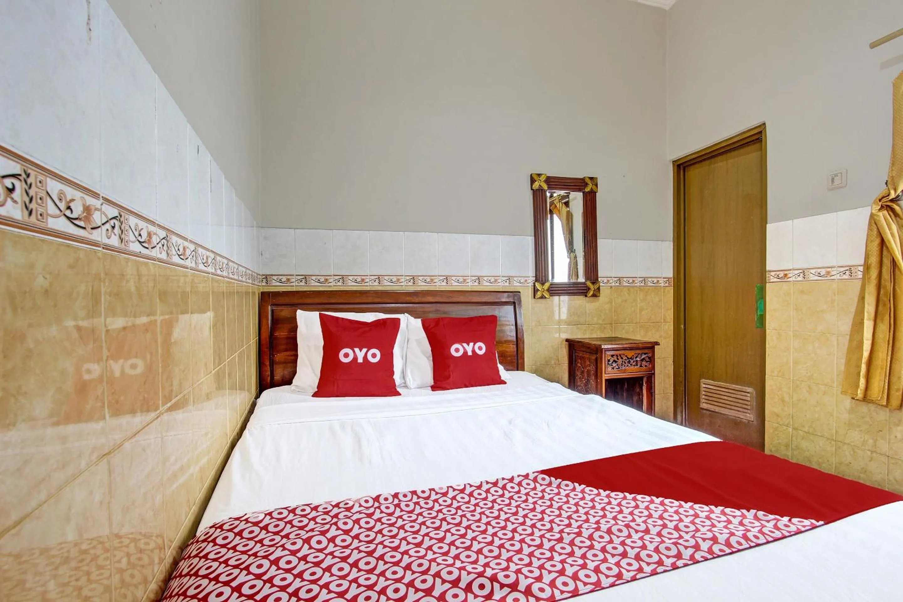 Bedroom in OYO 91785 Hotel Srikandi Kalasan