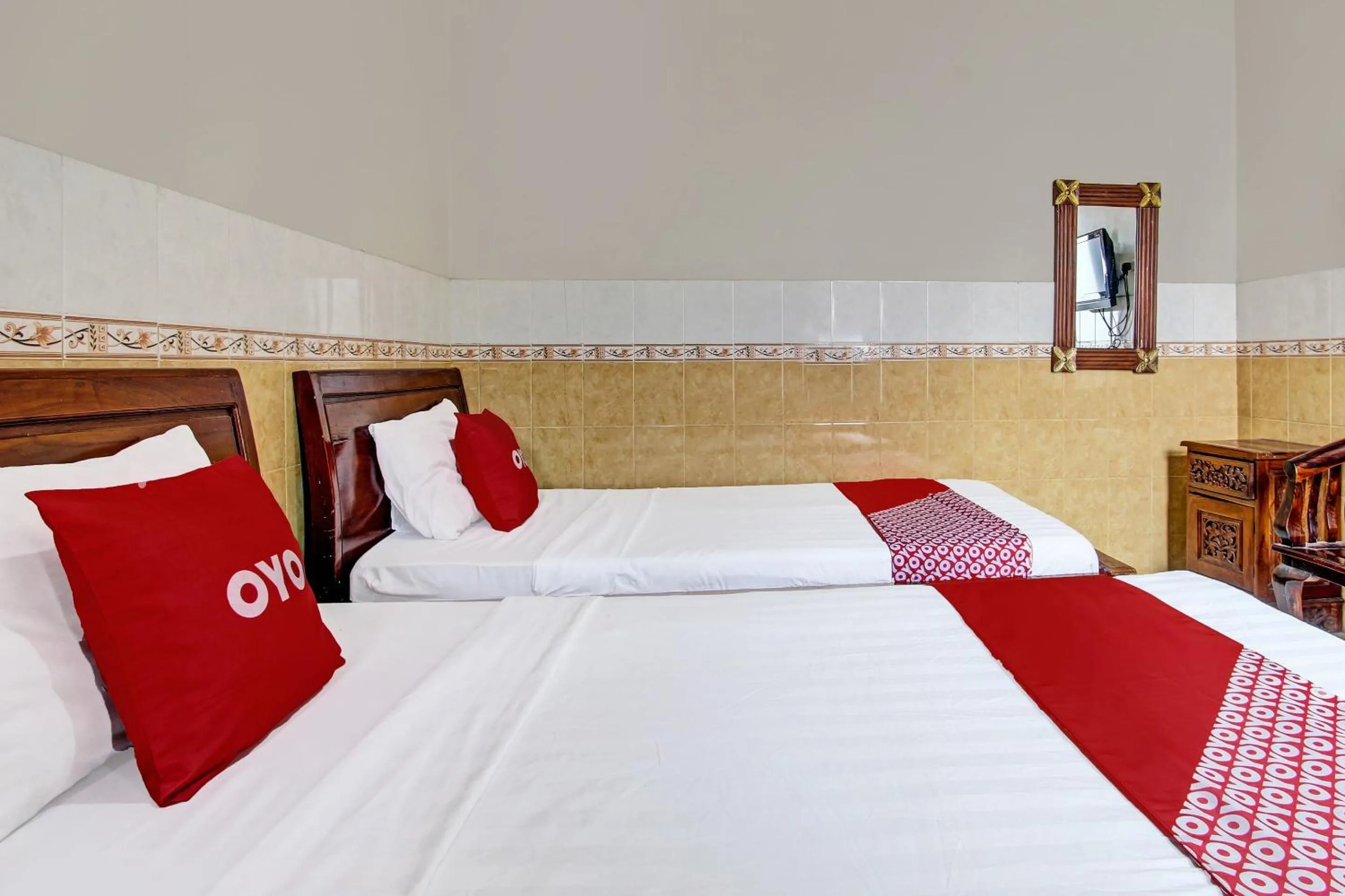 Bedroom in OYO 91785 Hotel Srikandi Kalasan