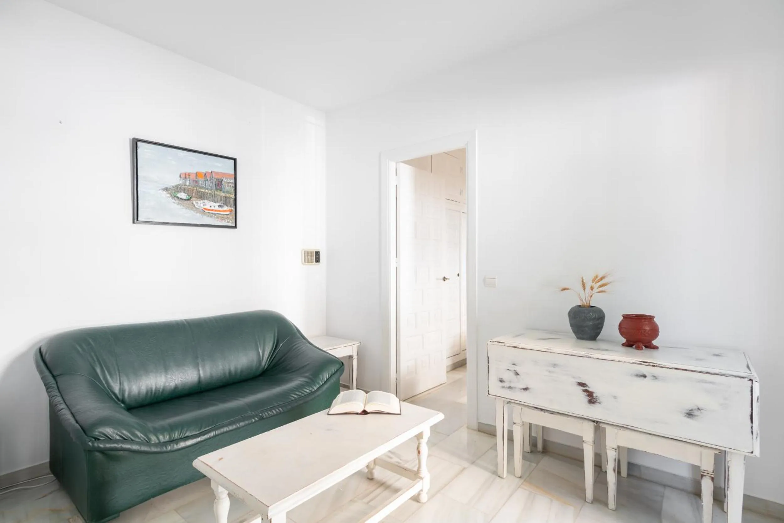 Living room in Apartahotel Playamaro by Dorobe