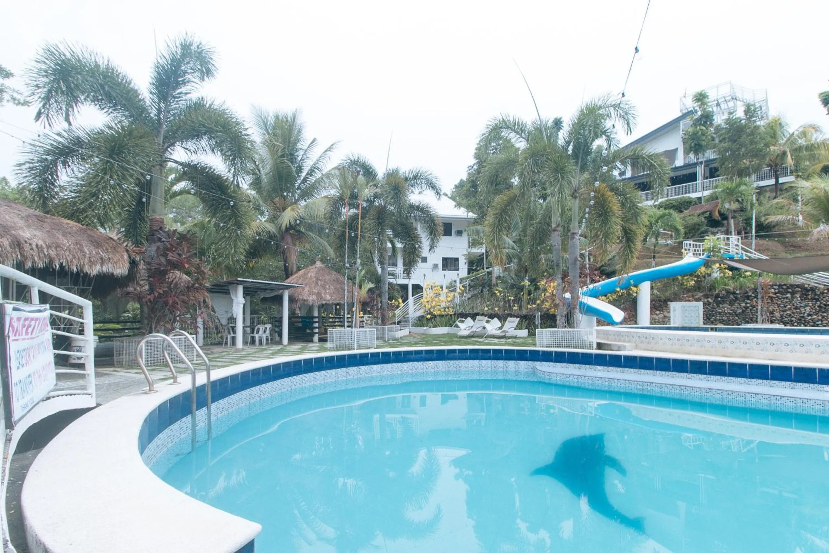 Swimming pool in RedDoorz @ Marceily Point Resort Guimaras