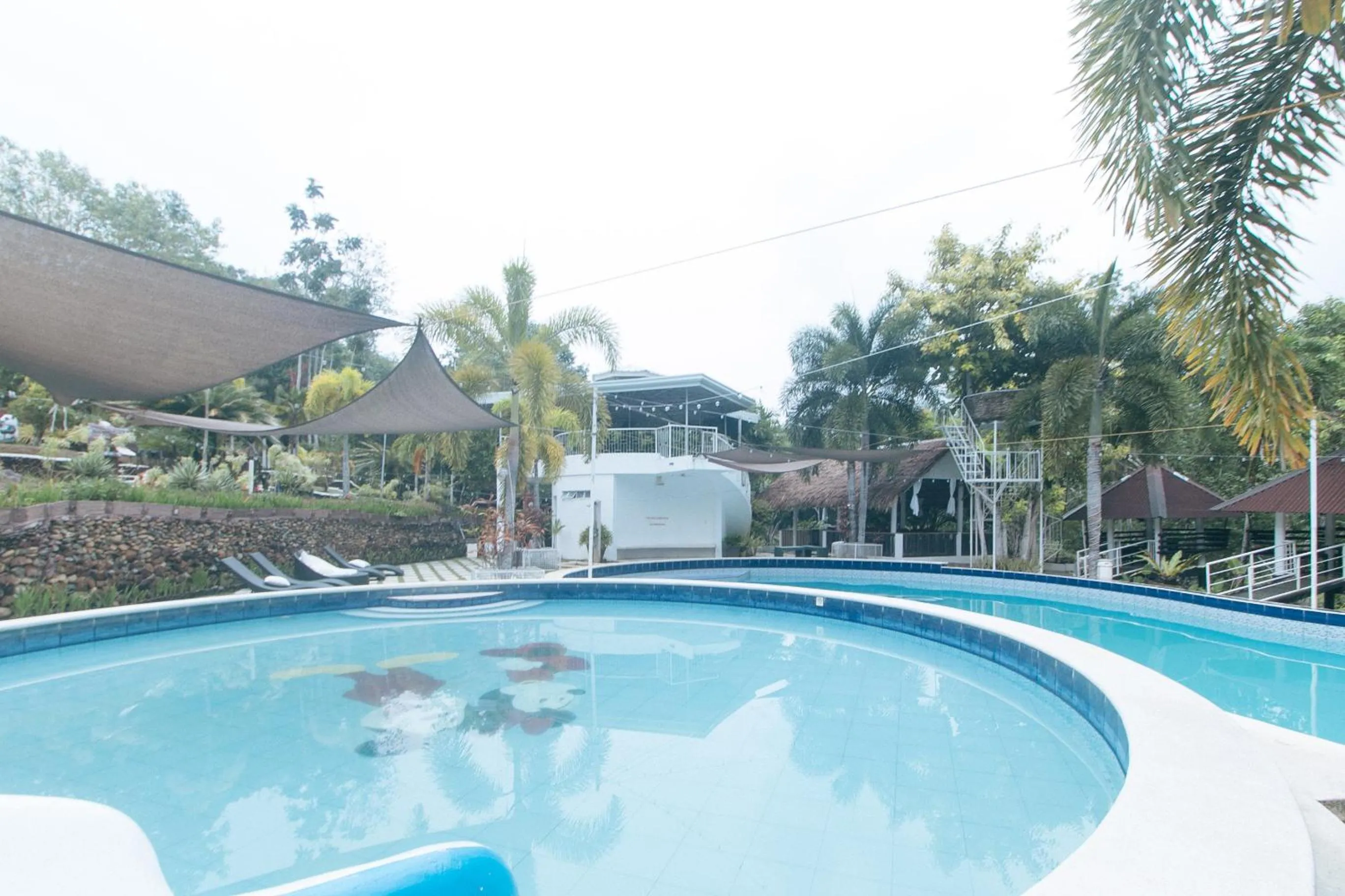 Swimming pool in RedDoorz @ Marceily Point Resort Guimaras