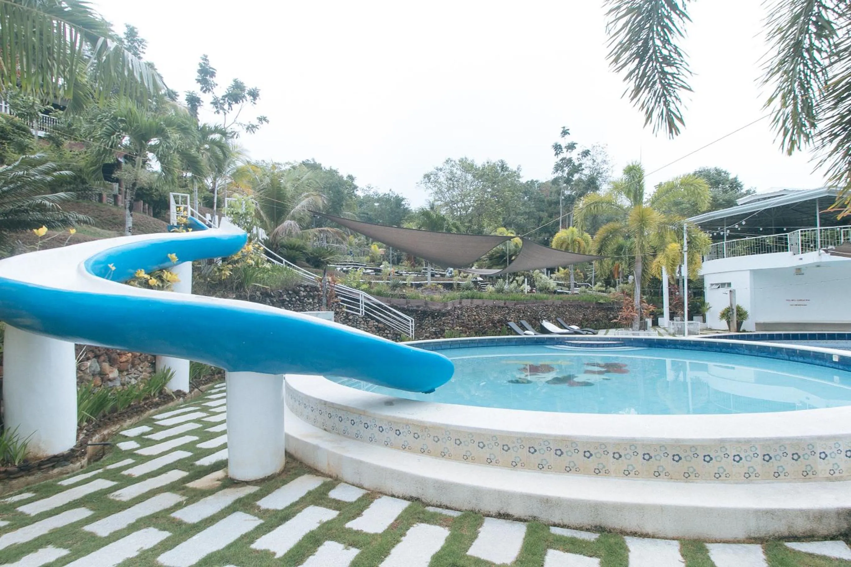 Swimming pool in RedDoorz @ Marceily Point Resort Guimaras