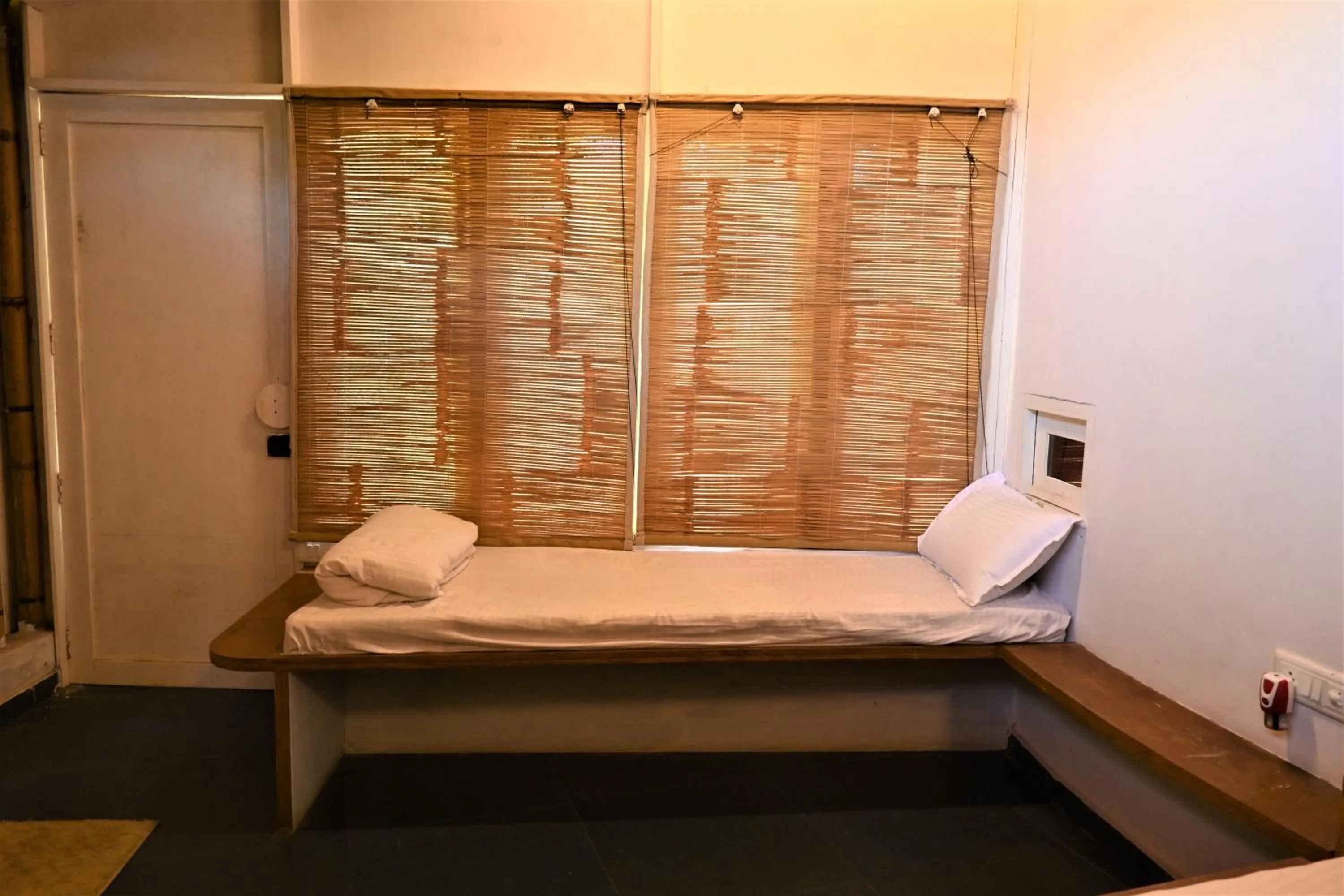 Bed in Amraness Luxury Resort Sasan Gir