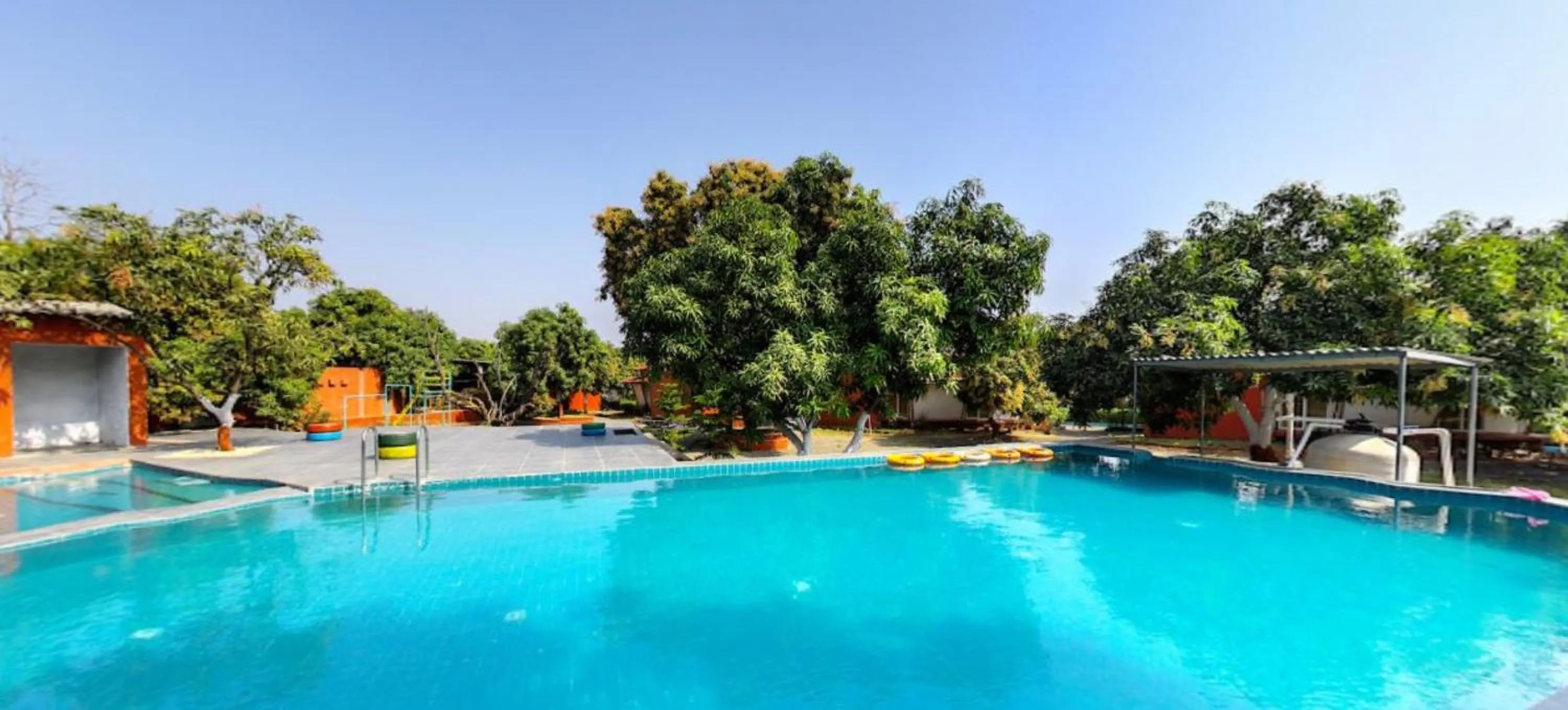 Swimming pool in Amraness Luxury Resort Sasan Gir