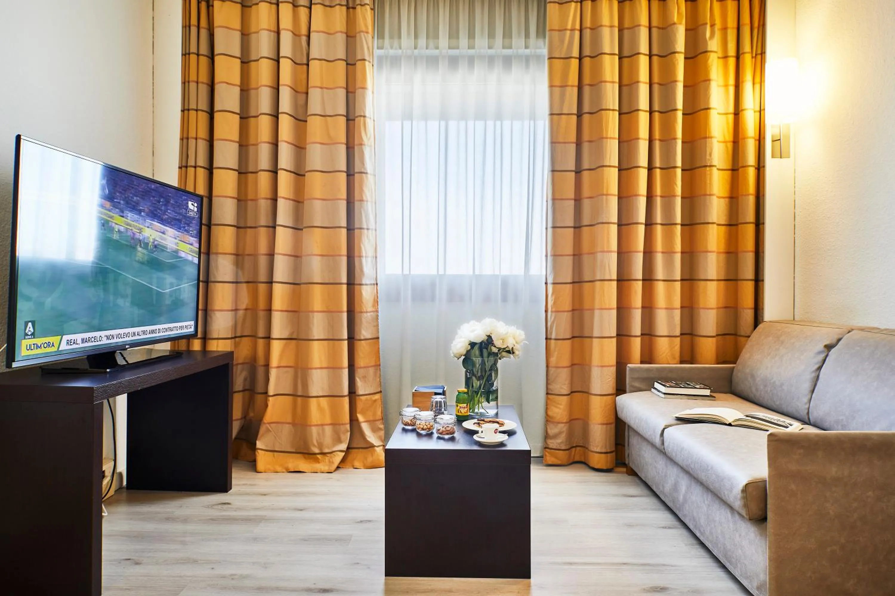 Living room in Living Place Hotel