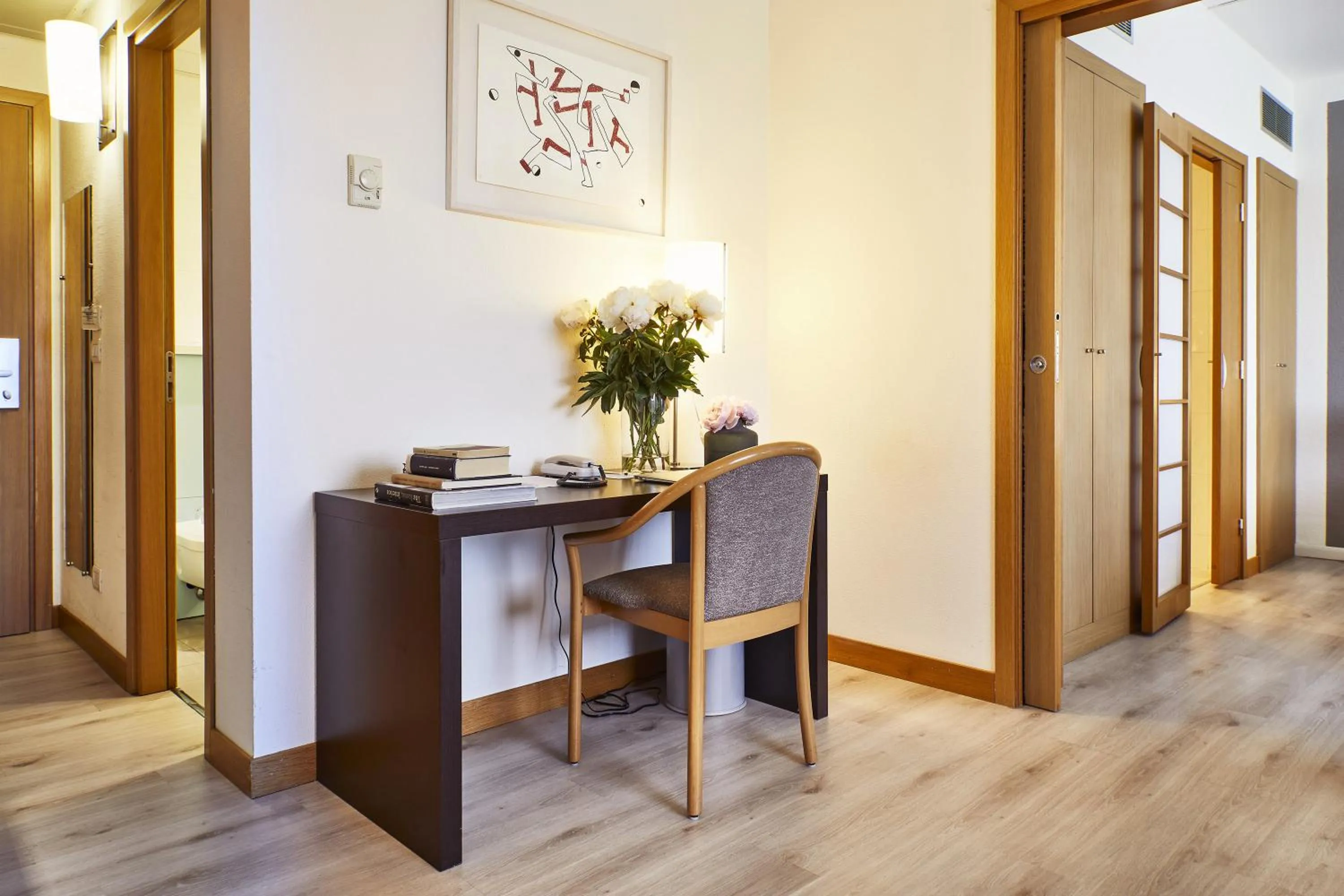 Seating area in Living Place Hotel