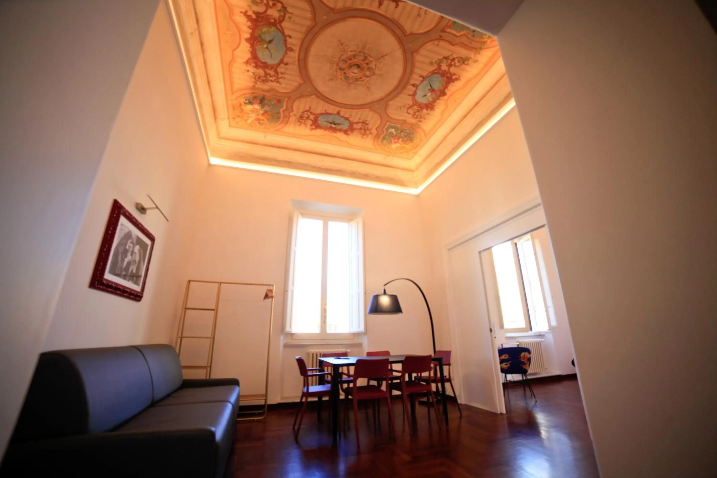 Communal lounge/ TV room in LUCIANO MONTI APARTMENT