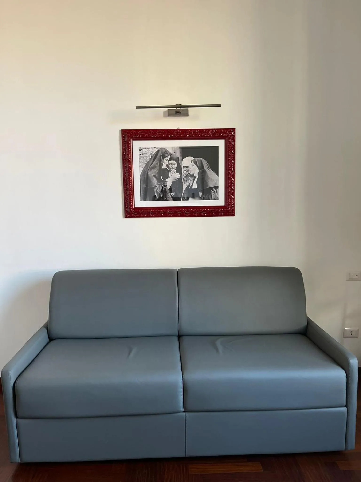 Communal lounge/ TV room in LUCIANO MONTI APARTMENT