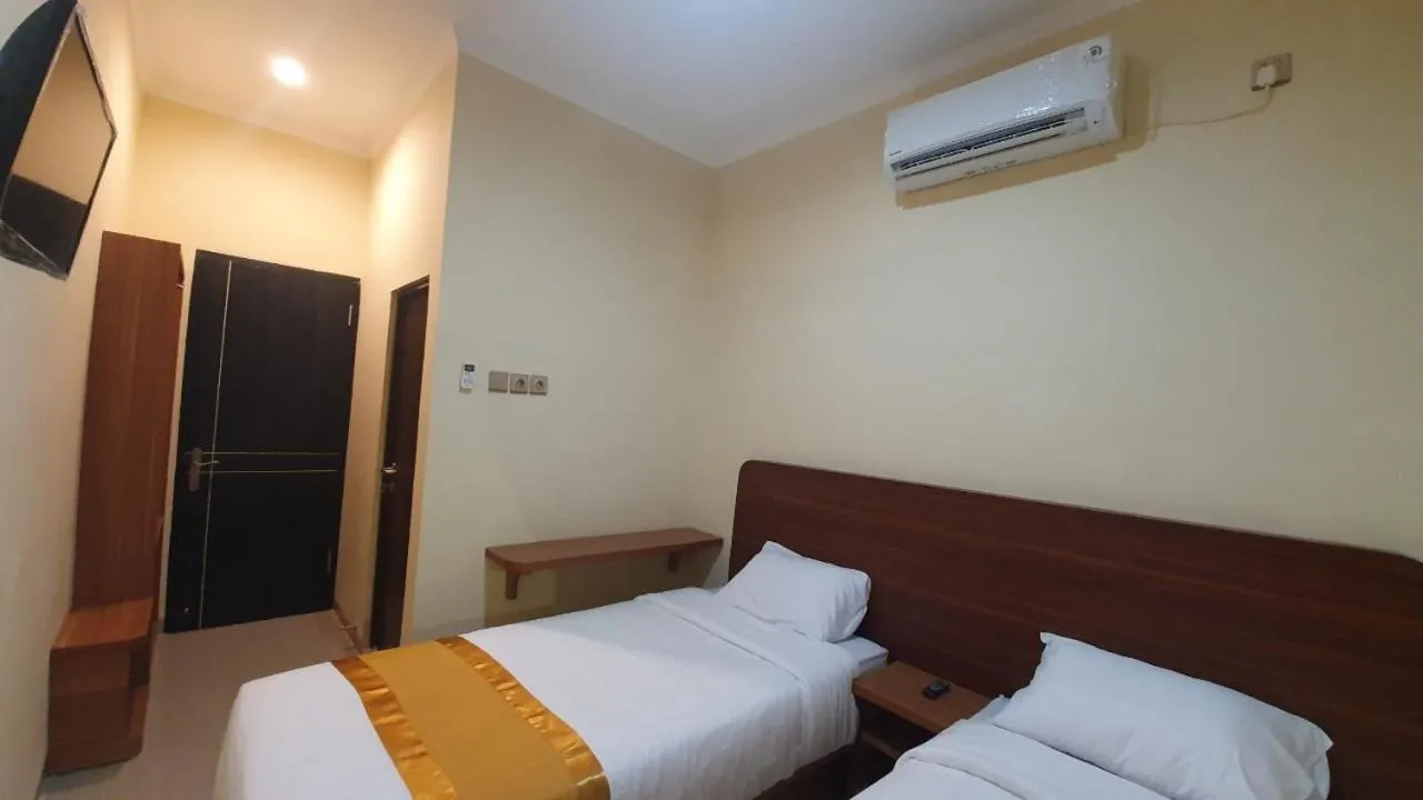 Bed in Harmony Inn Belitung - City Hotel