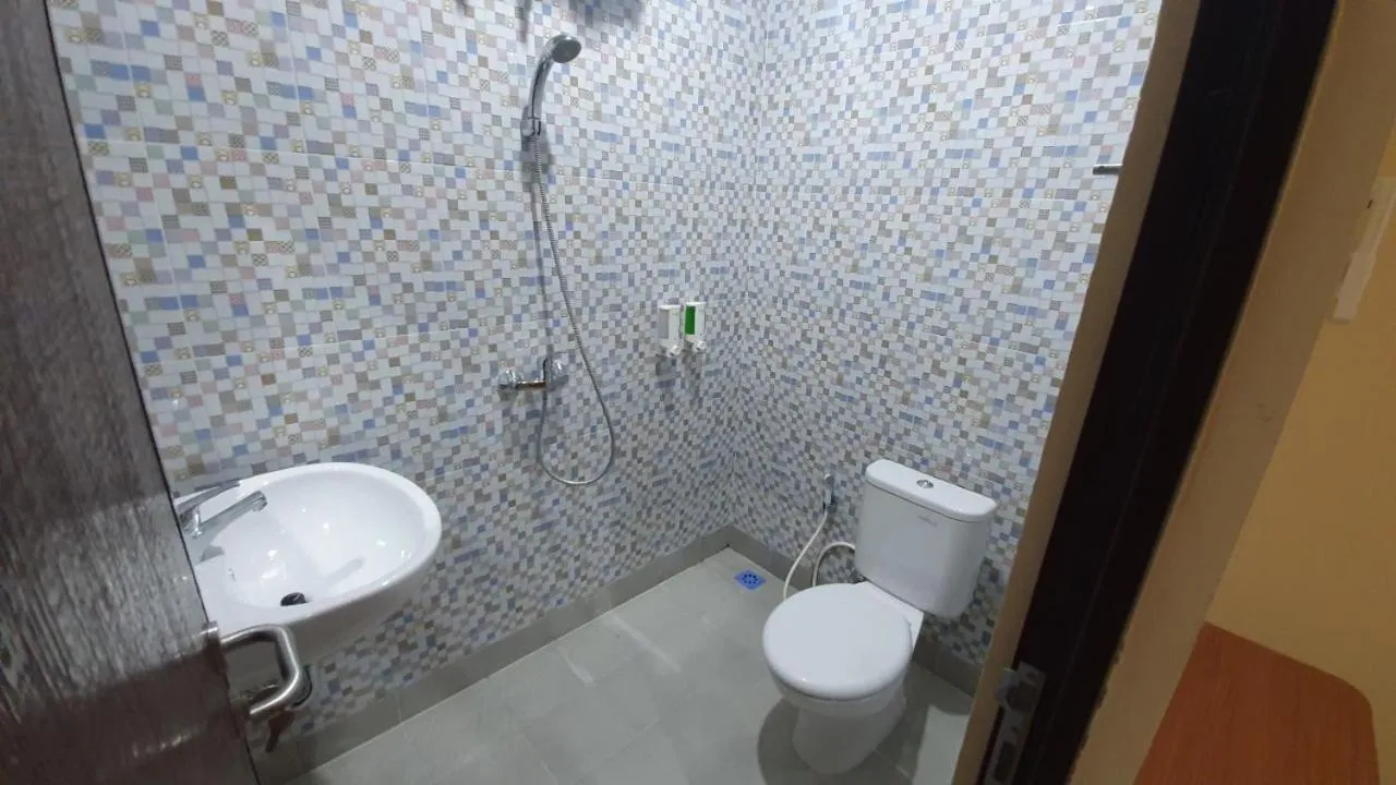 Bathroom in Harmony Inn Belitung - City Hotel