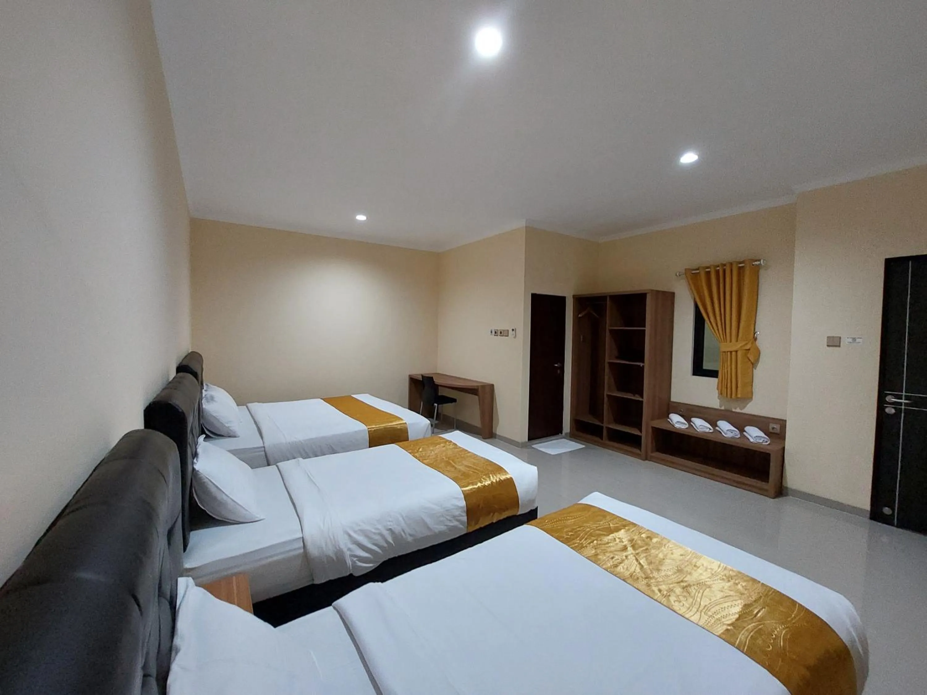 Bed in Harmony Inn Belitung - City Hotel