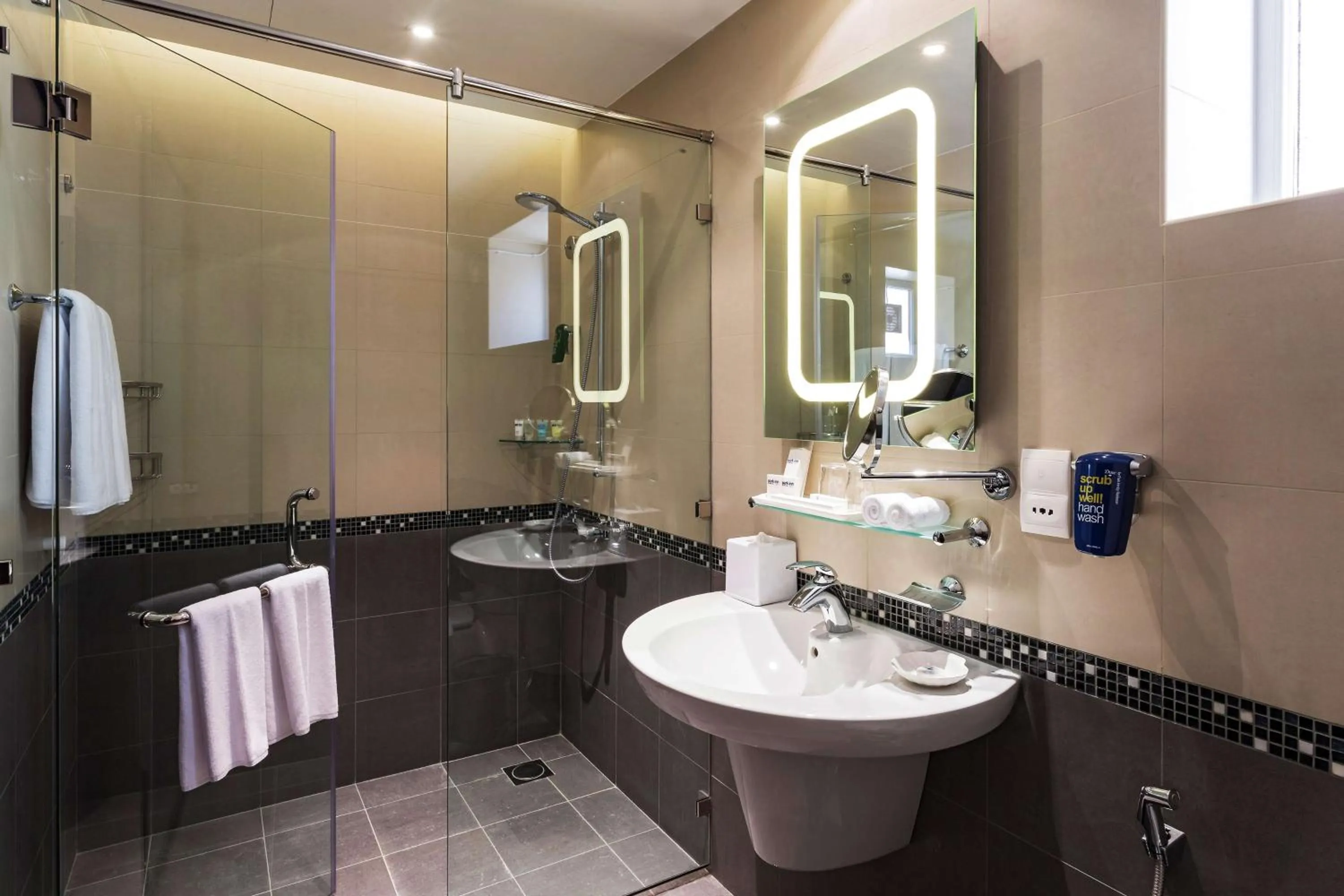 Bathroom in Park Inn by Radisson Hotel and Residence Duqm