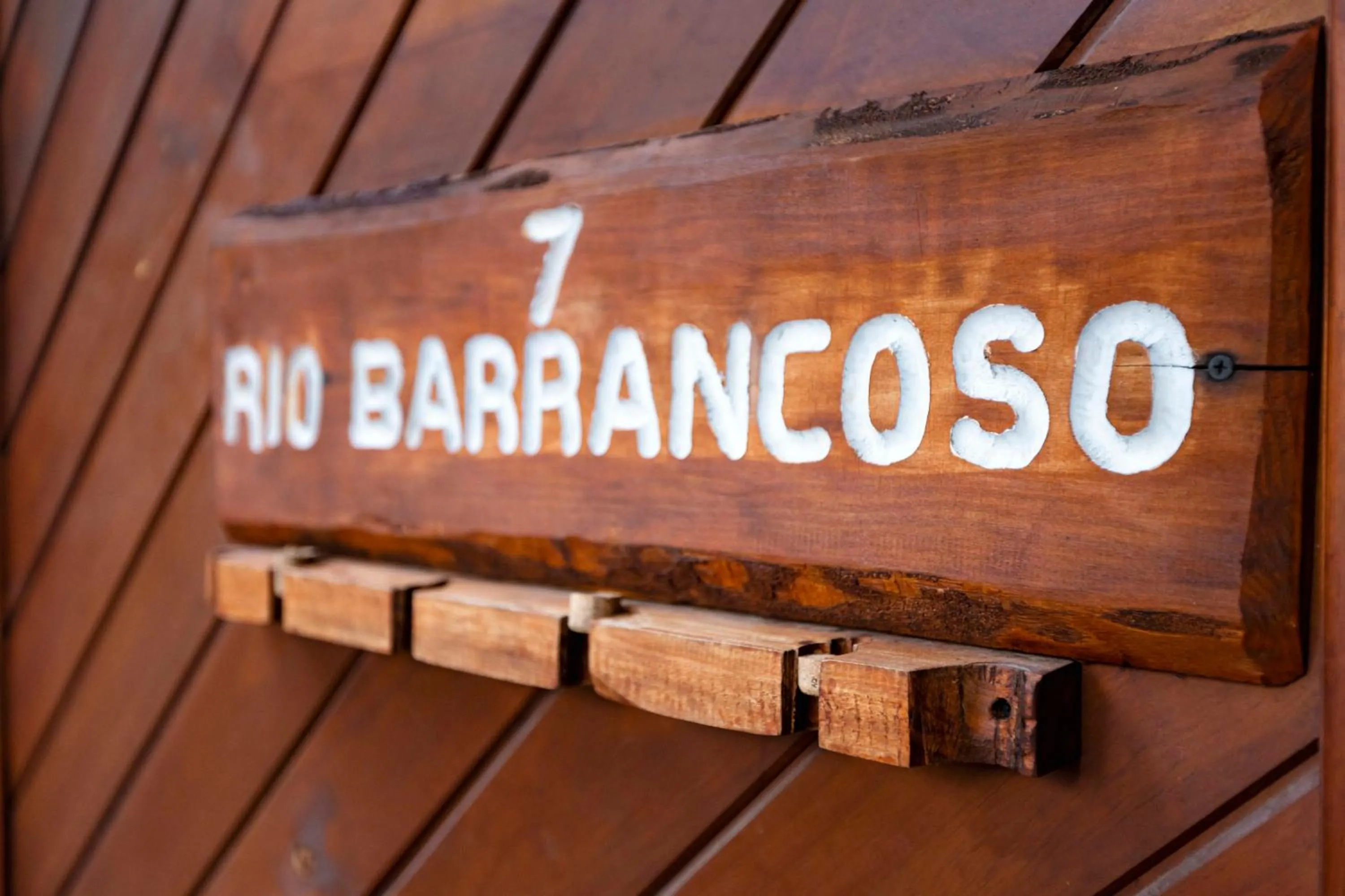 Property logo or sign in Green Baker Lodge