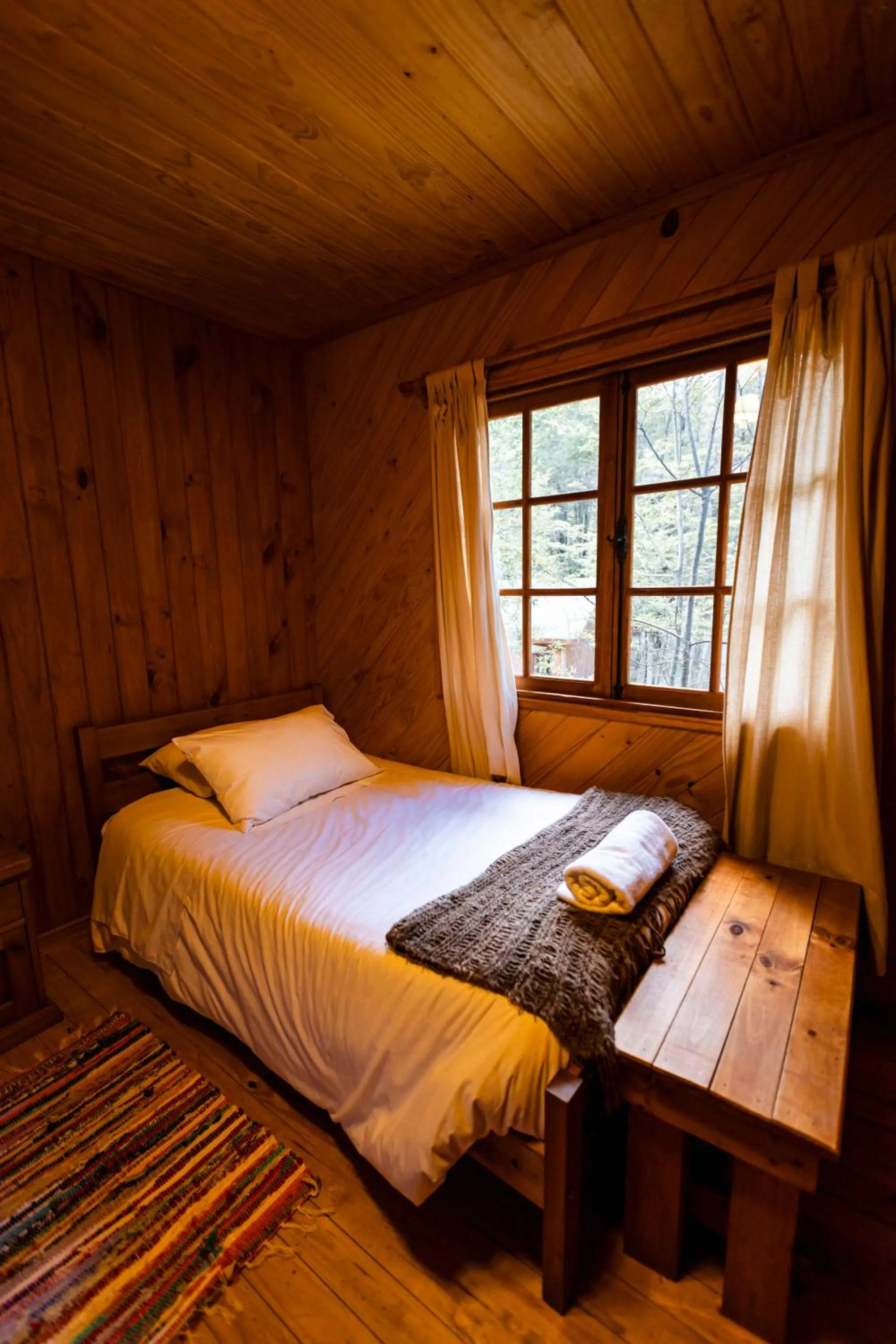 Bed in Green Baker Lodge