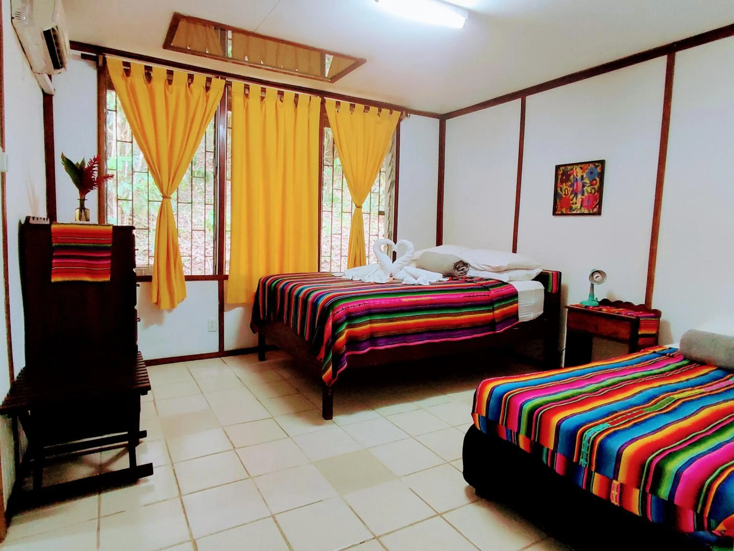 Bed in Maya Mountain Lodge
