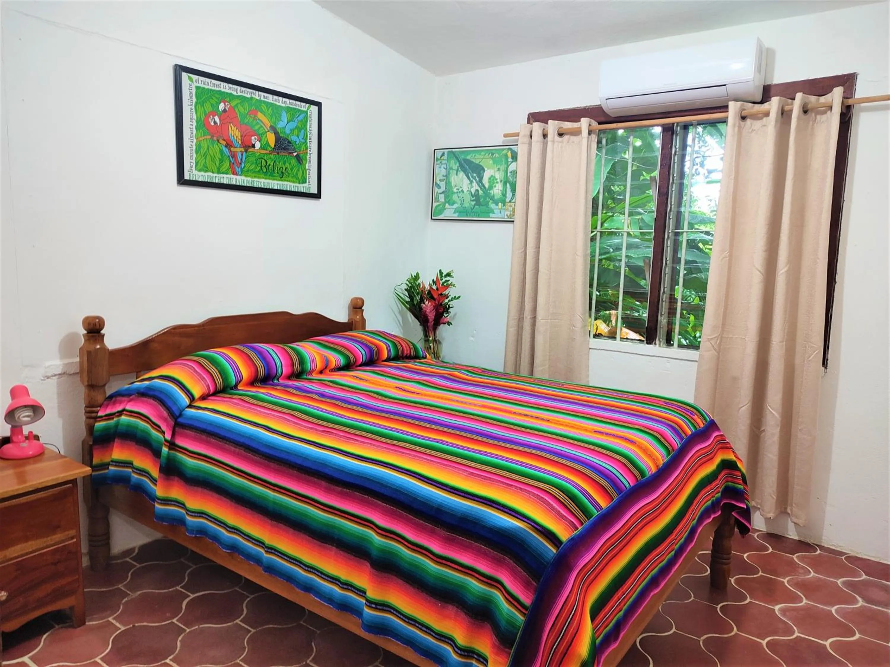 Bed in Maya Mountain Lodge