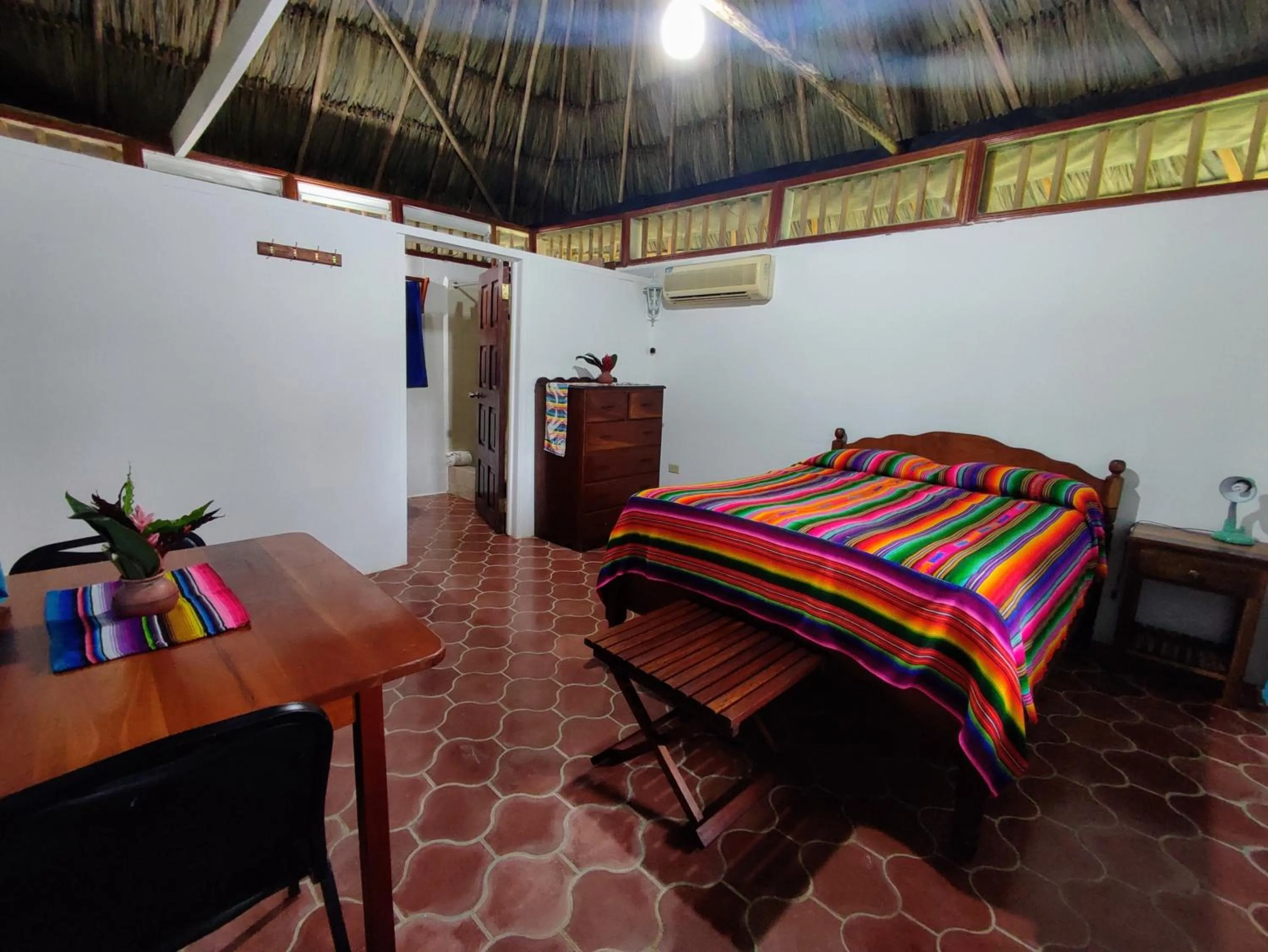 Bed in Maya Mountain Lodge