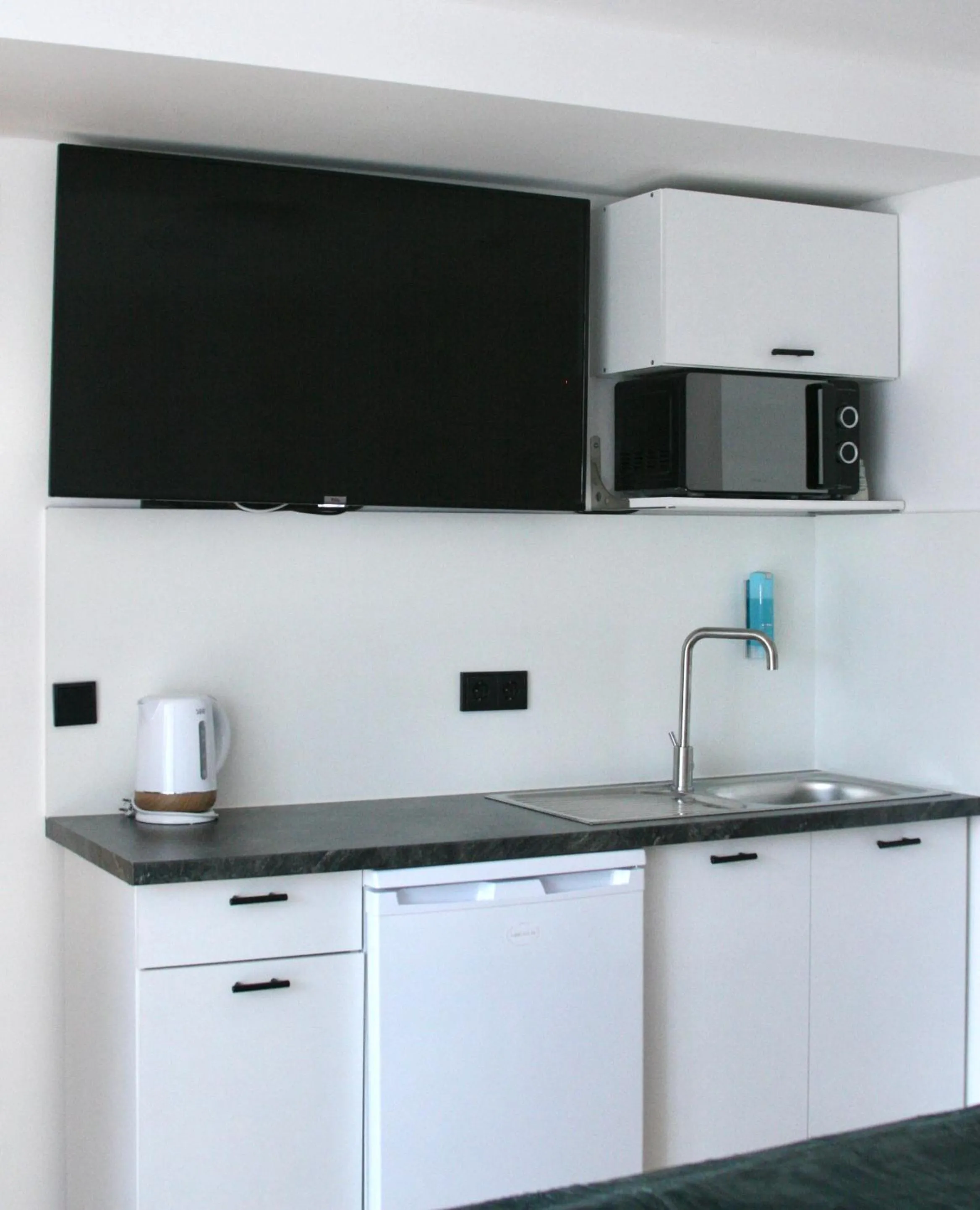 TV and multimedia in The Manhattan A Boutique Hotel By American Ease