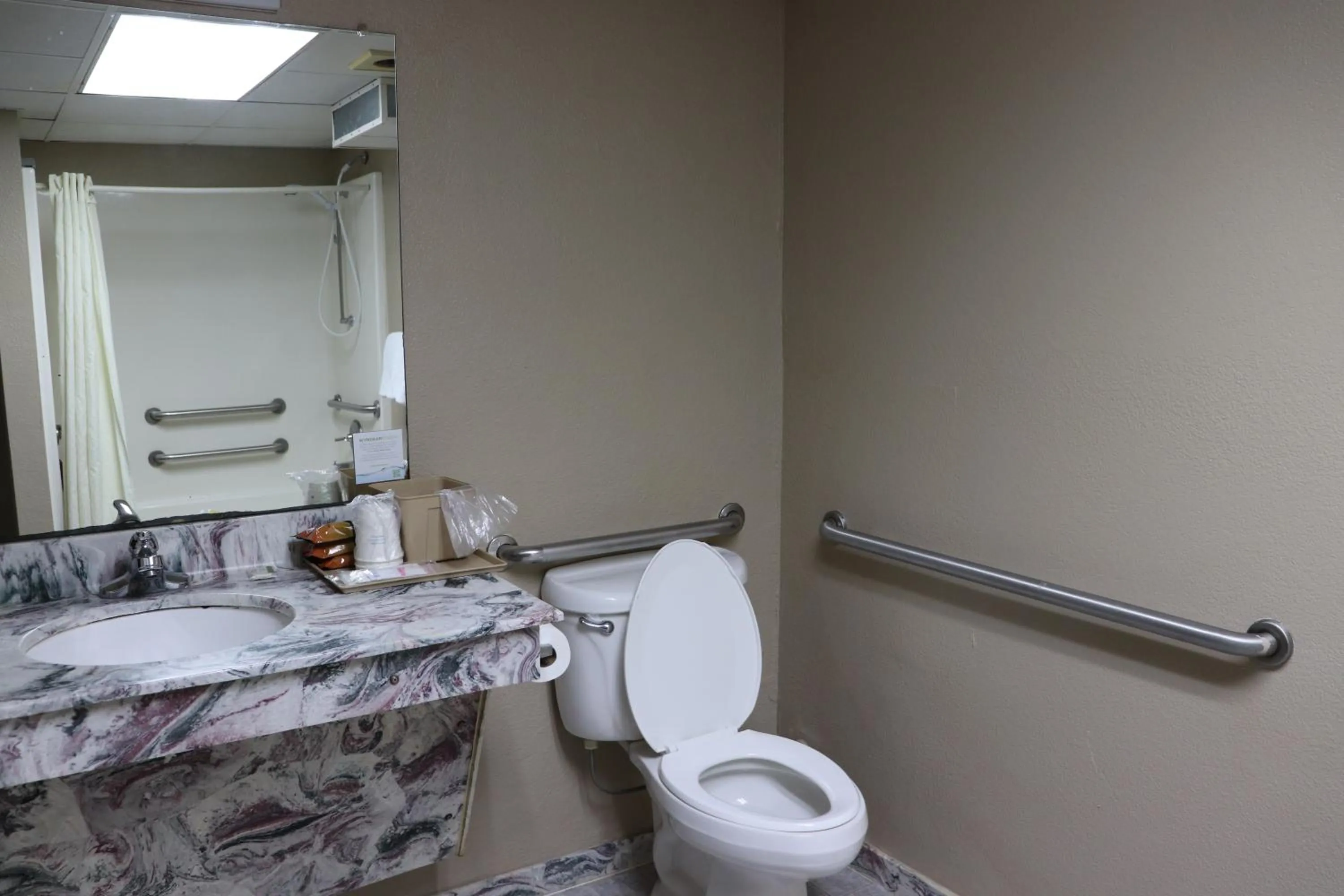 Toilet in Super 8 by Wyndham Clarksville East