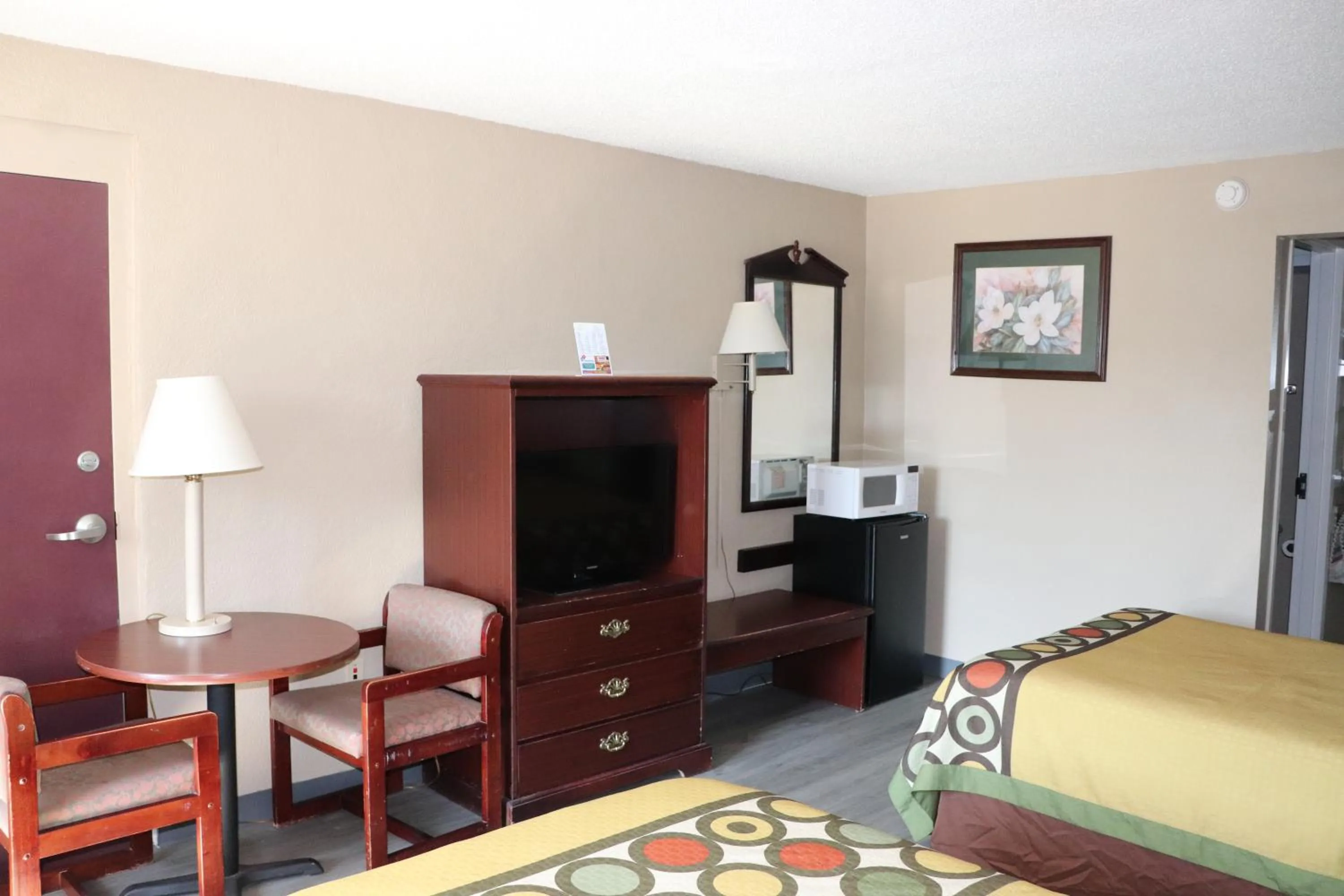 Bed in Super 8 by Wyndham Clarksville East